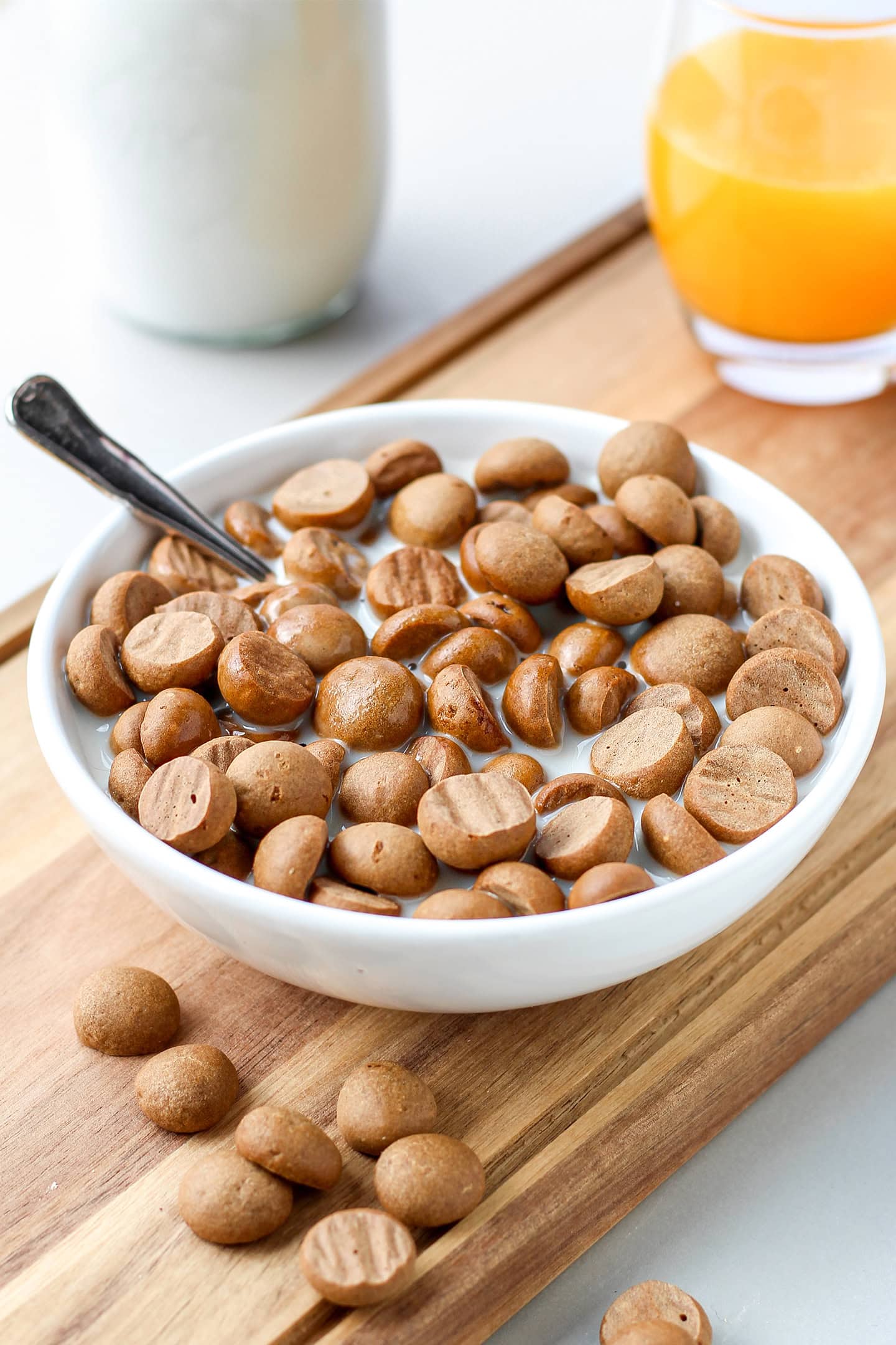 Bowl filled with milk and homemade cereal.