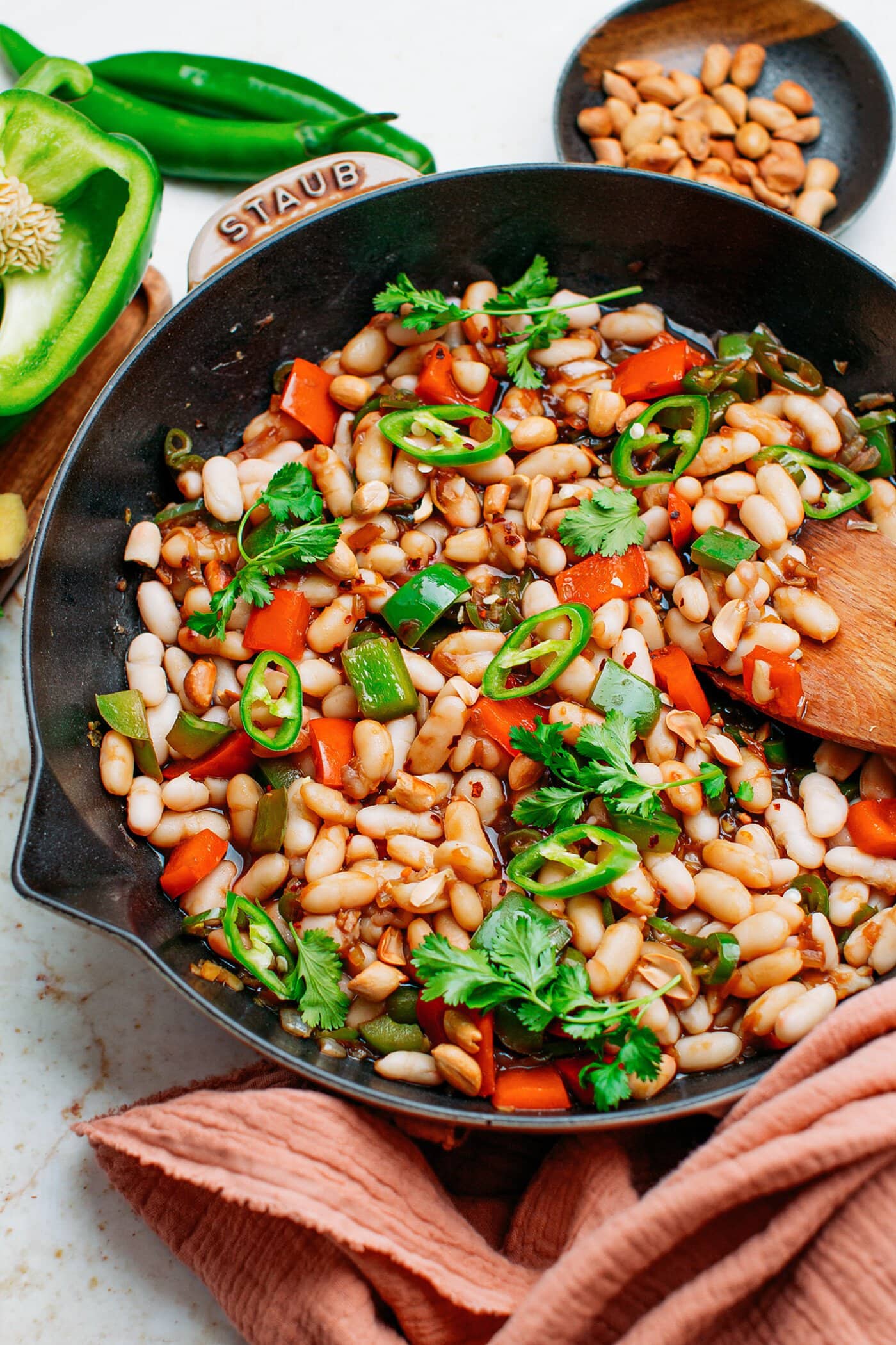White beans in a Kunk Pao sauce with chili and peanuts.