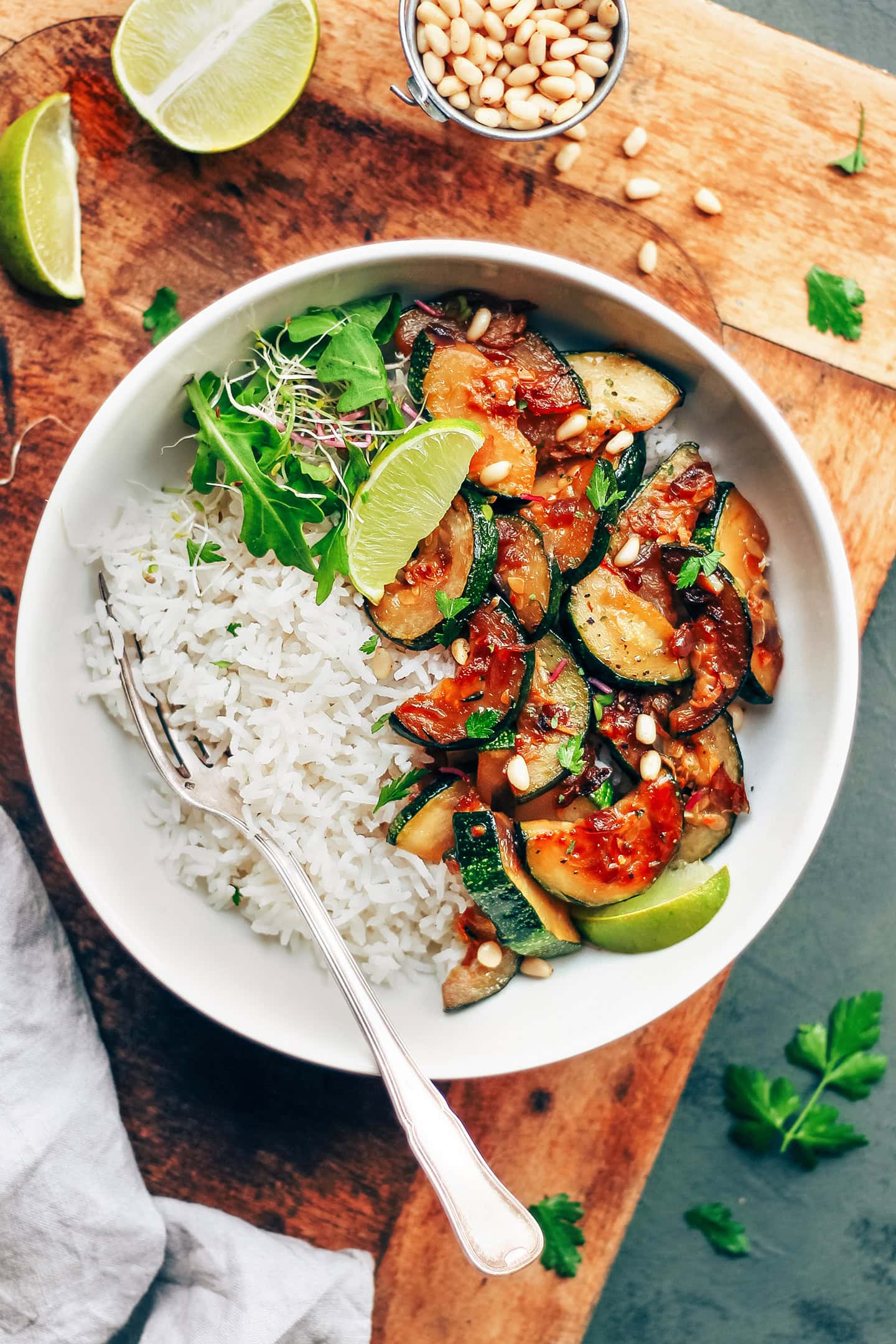 Caramelized zucchini with rice in a bowl.
