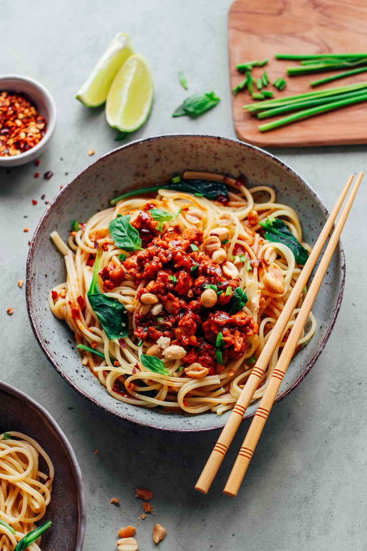 Noodles topped with tempeh scramble and Sichuan sauce.