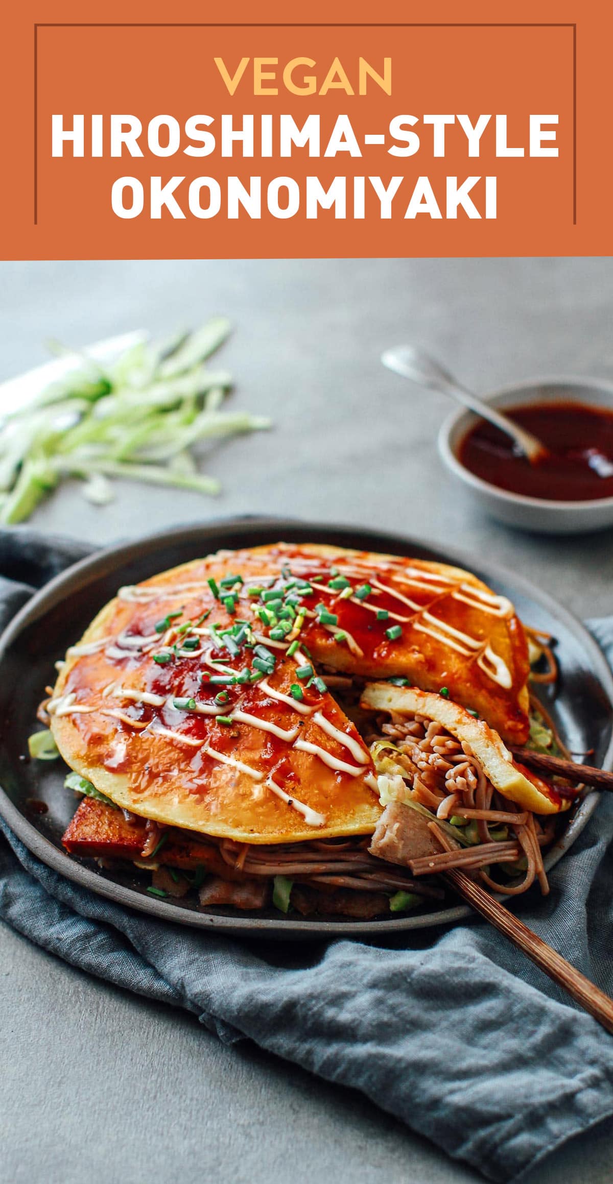 Hiroshima-style Okonomiyaki loaded with sautéed soba noodles, smoky tofu, cabbage and topped with a soft tofu omelet! Plus it's brushed with a sweet and savory sauce and drizzled with mayo!