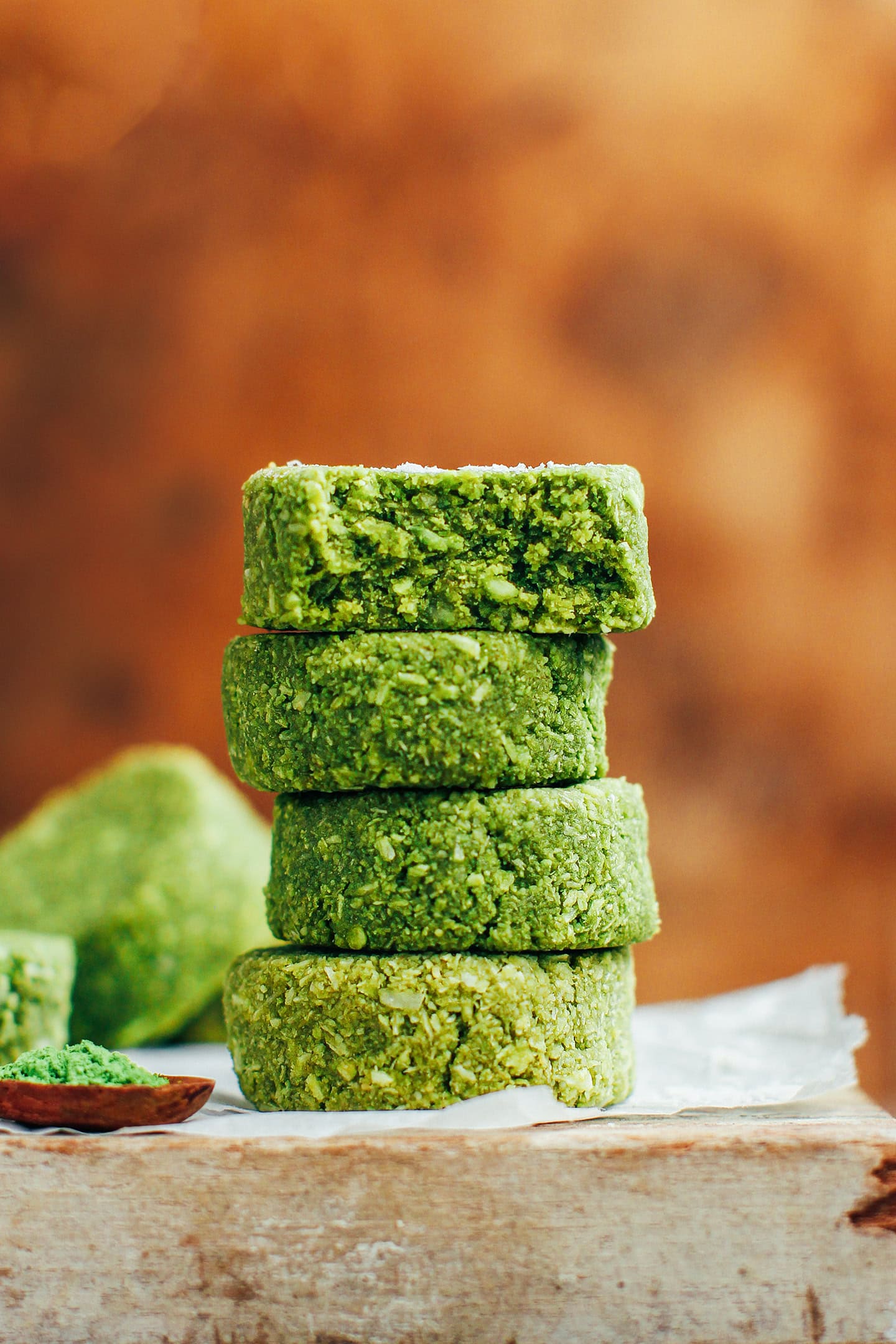 Stack of matcha coconut cookies.