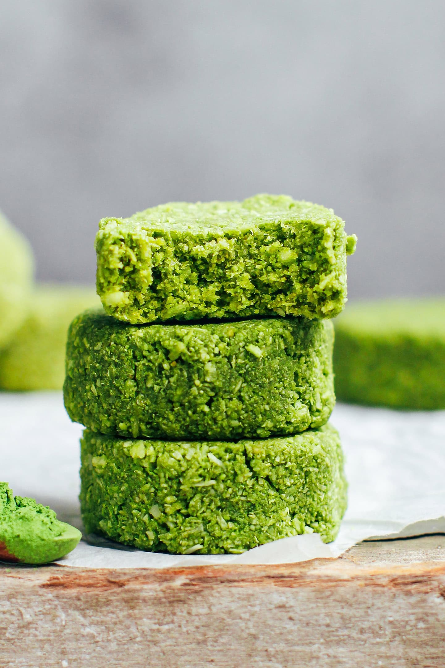 Stack of chewy matcha coconut cookies.