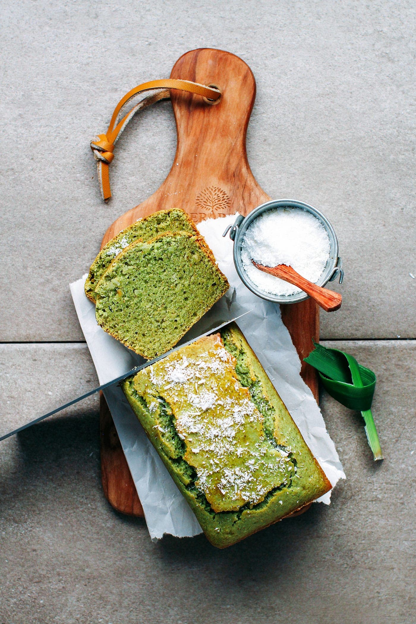 Pandan bread on a wooden board.