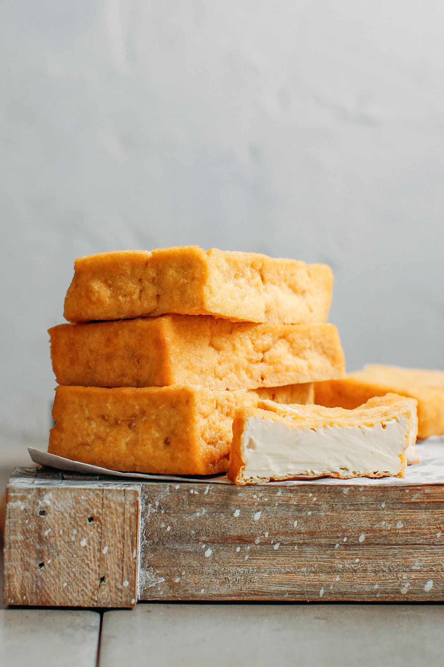 Stacked blocks of deep-fried tofu.