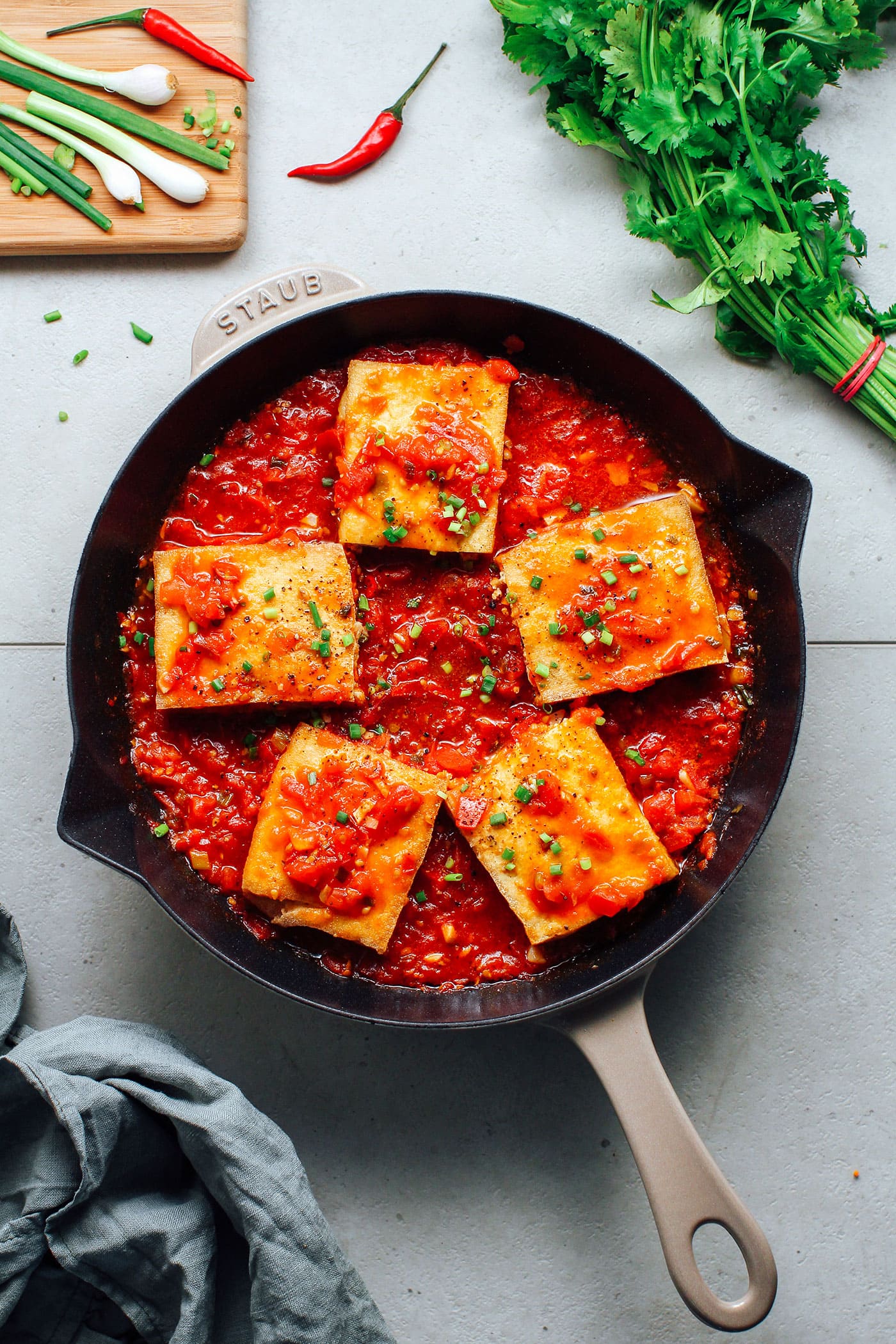 Stuffed Tofu in Tomato Sauce in a skillet.