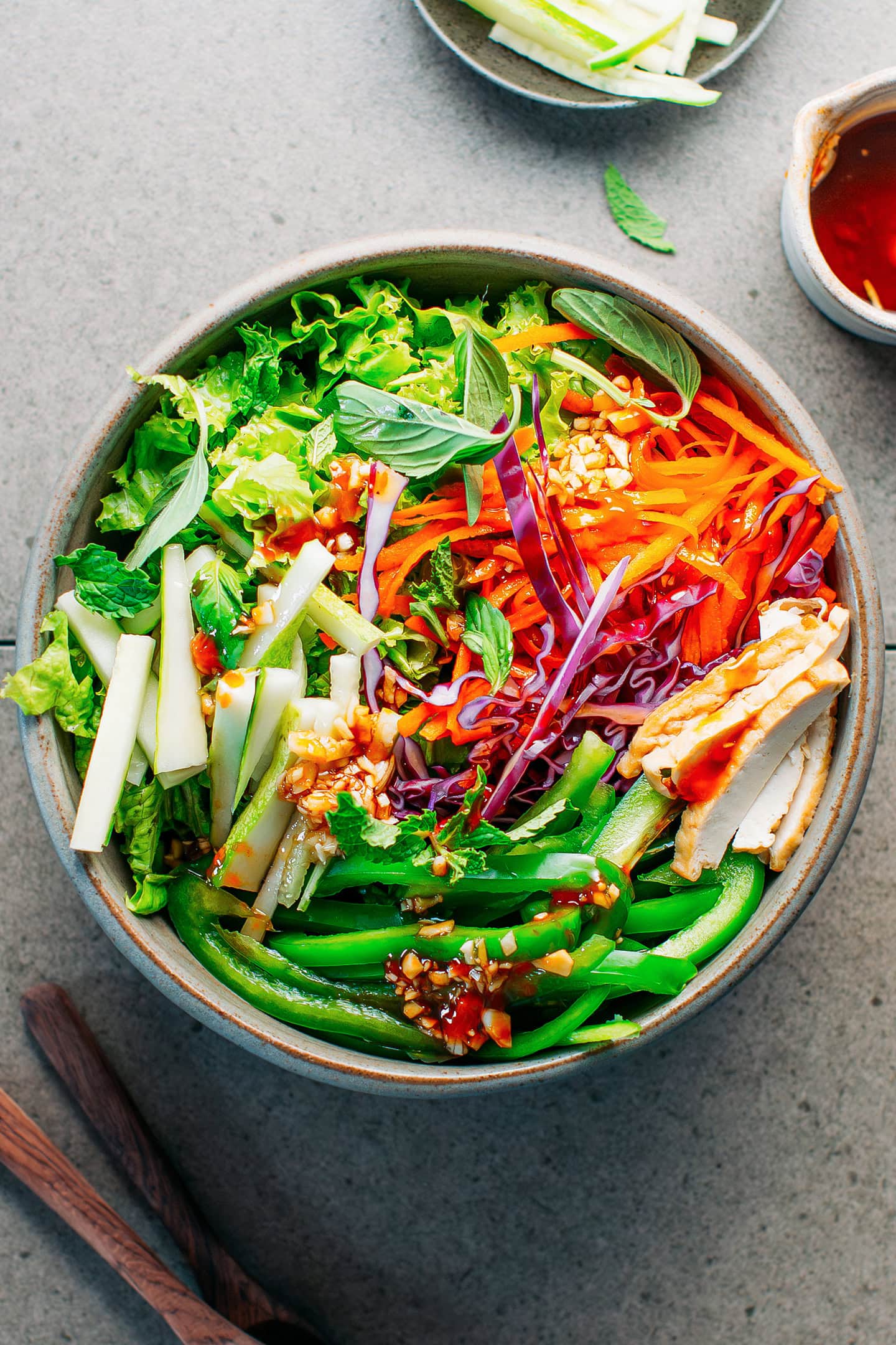 Mint and basil green salad in a bowl.