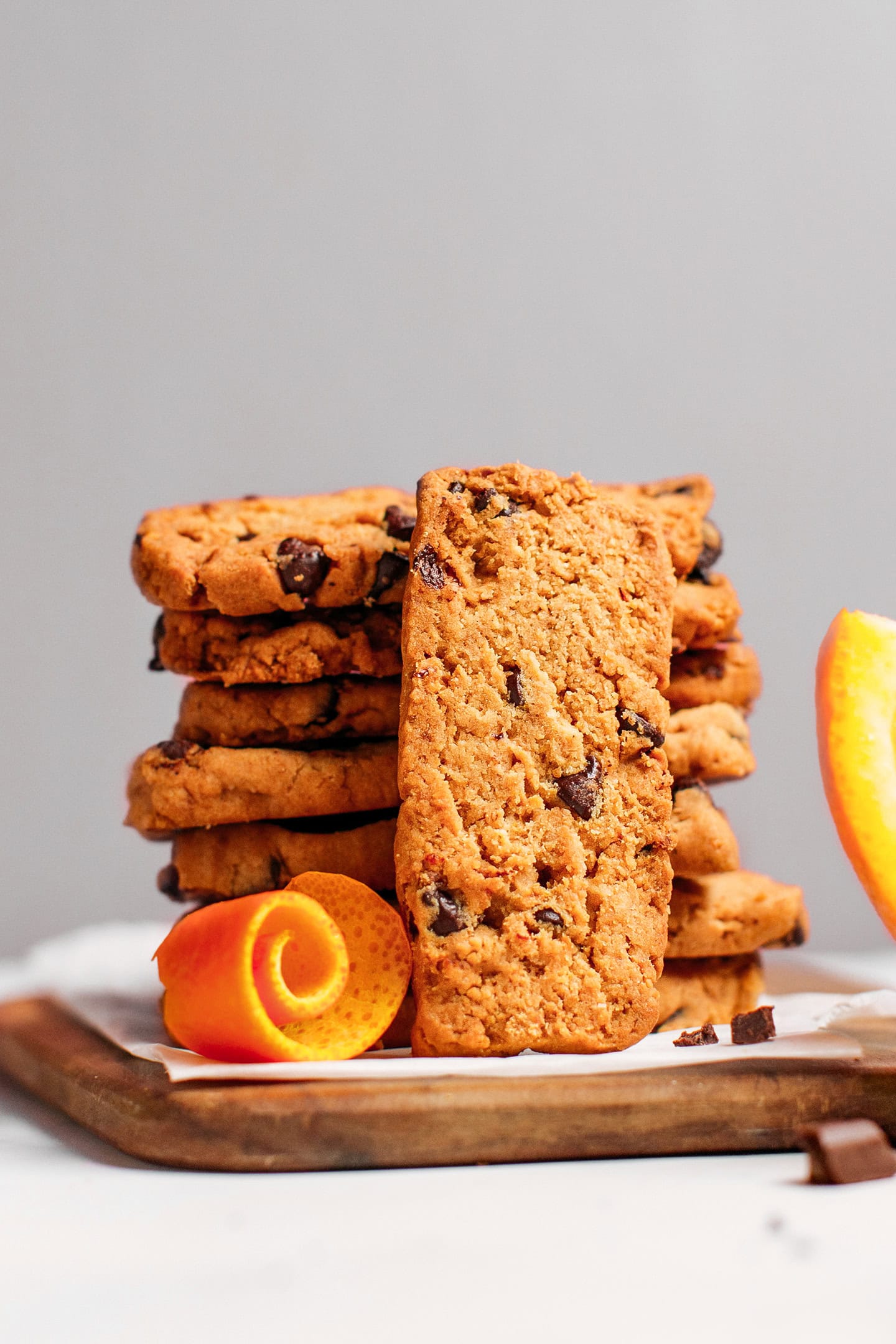 Stack of chocolate and orange cookies.