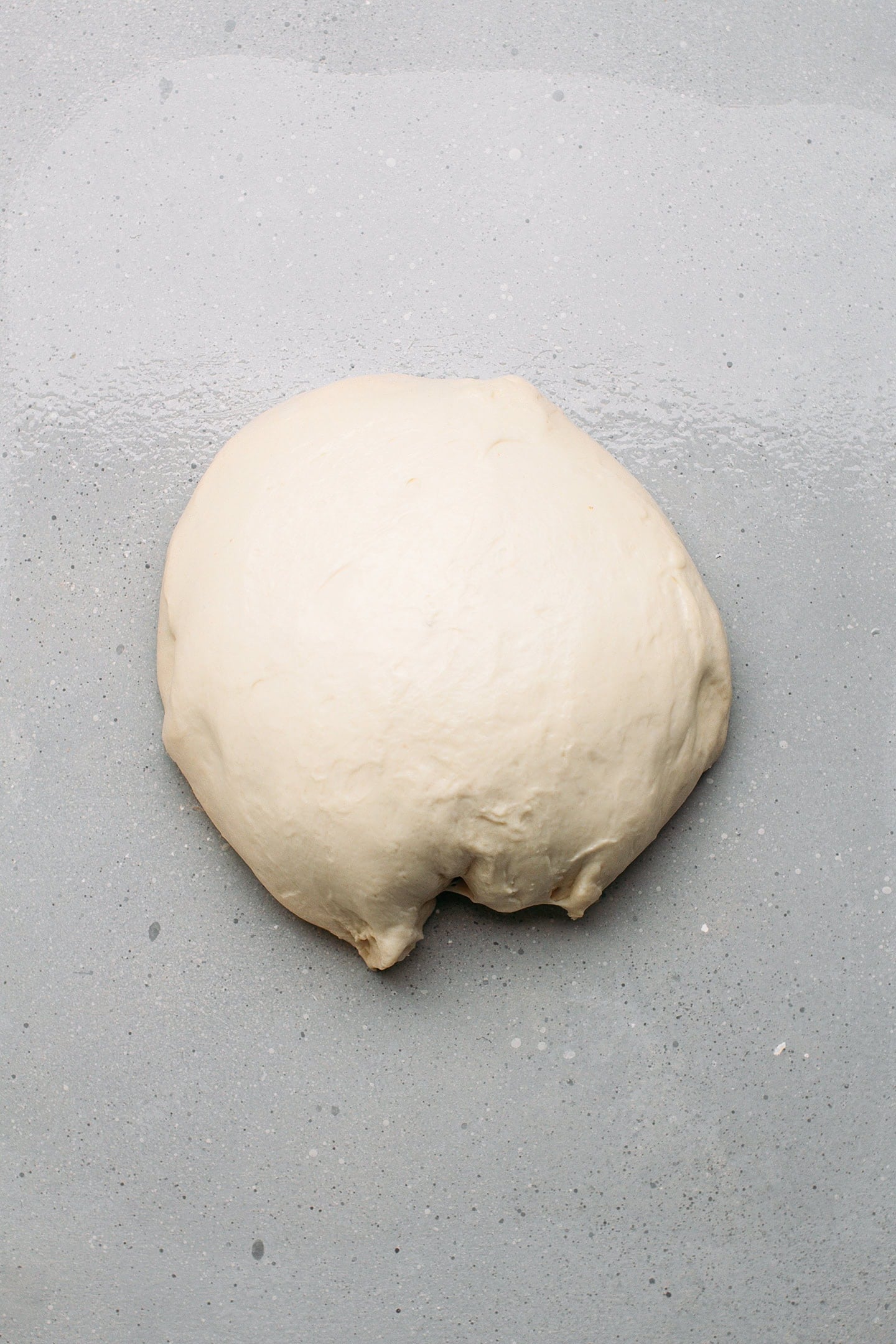 Ball of dough on a working surface.