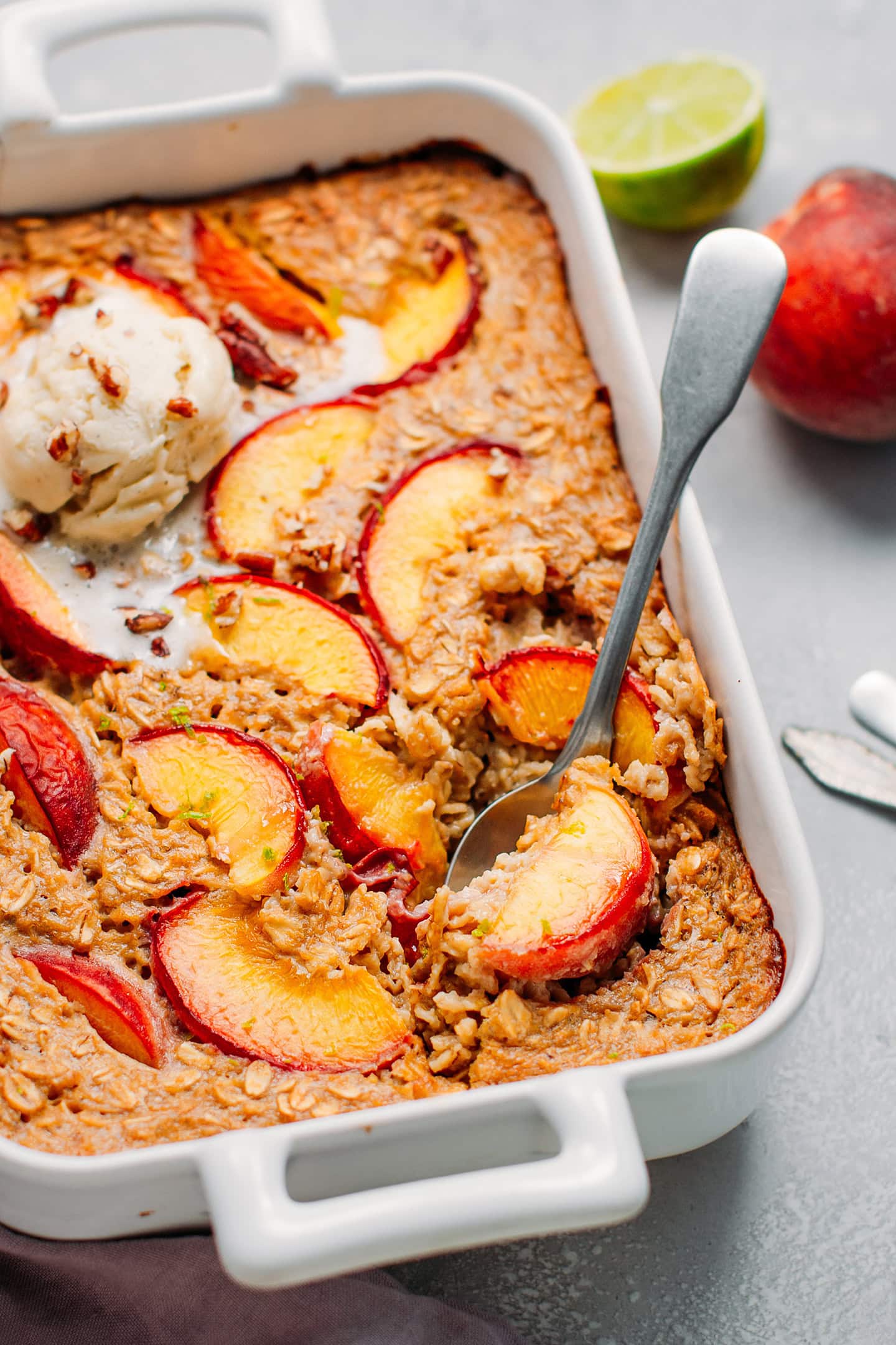 Close-up of baked oatmeal topped with peaches.