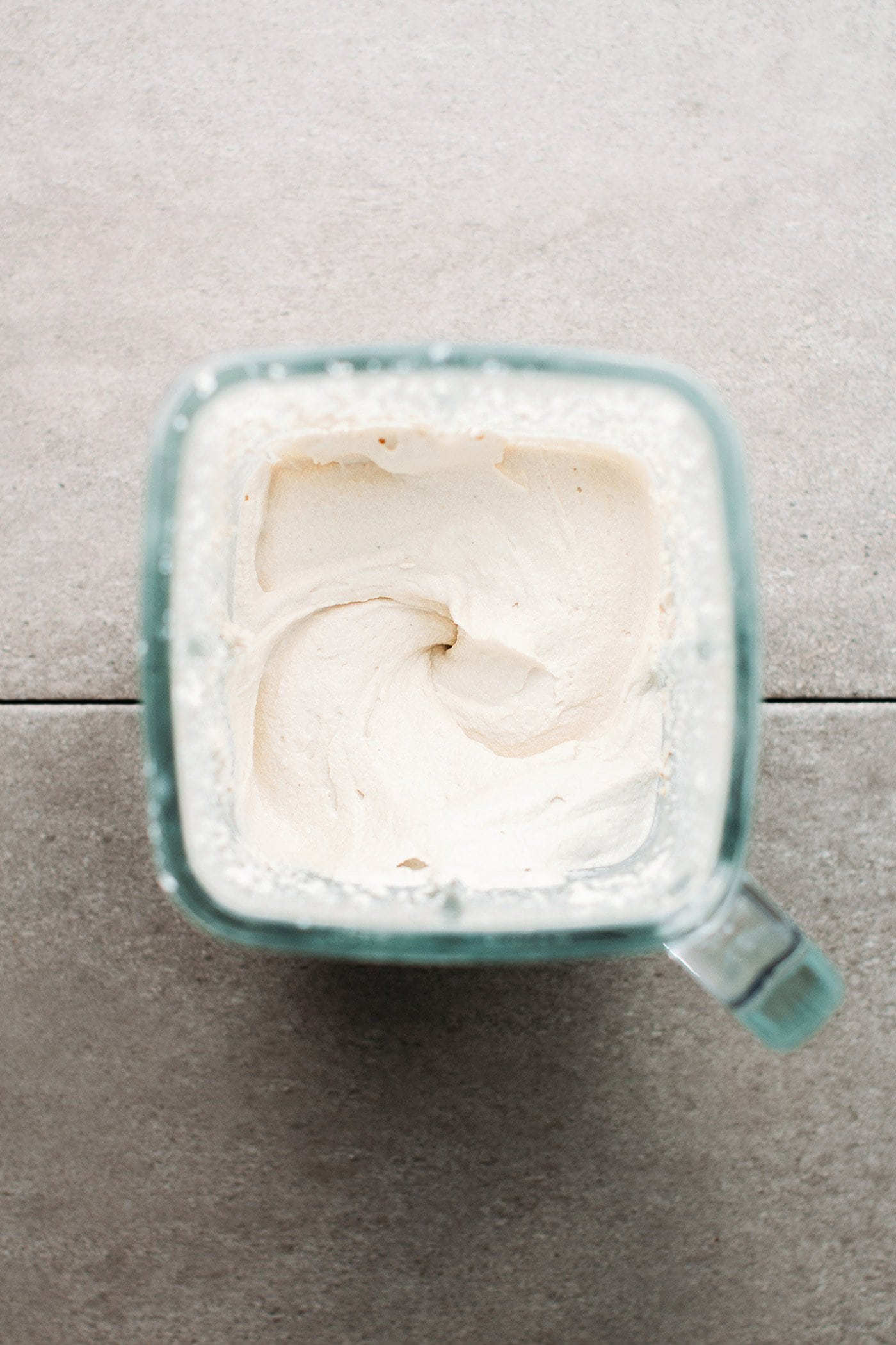 Cashew cream in a blender.