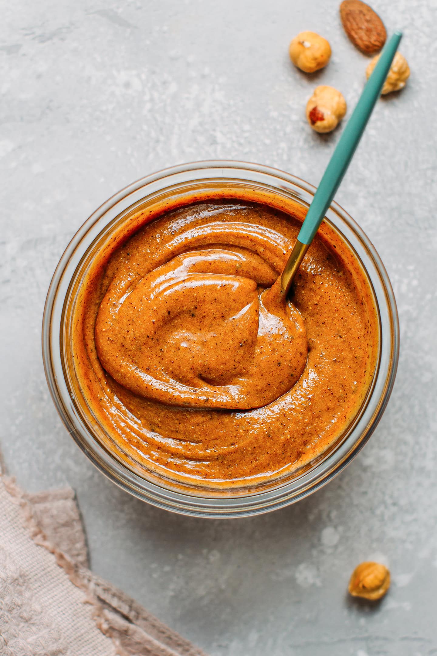 Caramelized hazelnut and almonds paste in a jar.