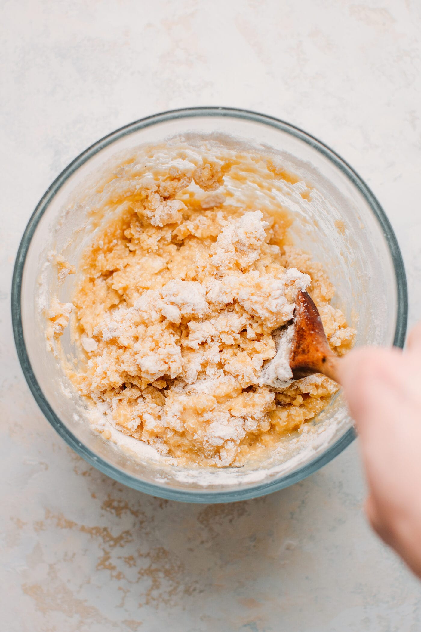 Mixing the dough to prepare vegan churros.