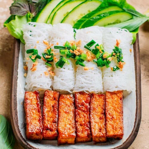 Vietnamese rice vermicelli woven with chewy tofu and fresh herbs.