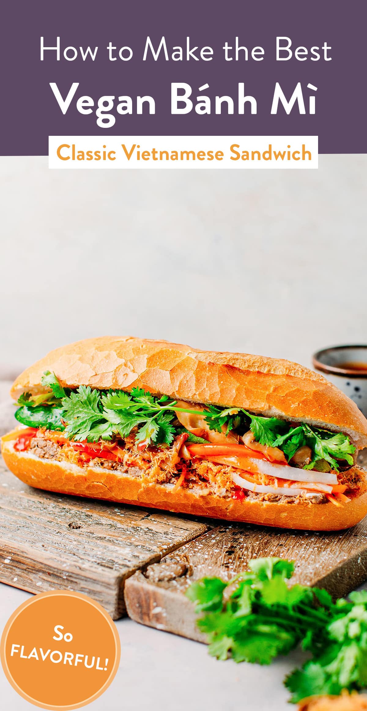 Super rich and flavorful vegan banh mi made with carrot and daikon pickles, vegan sausage, sautéed mushrooms, vegan paté, cucumber, and plenty of fresh herbs! #banhmi #vietnamese #vegan #plantbased