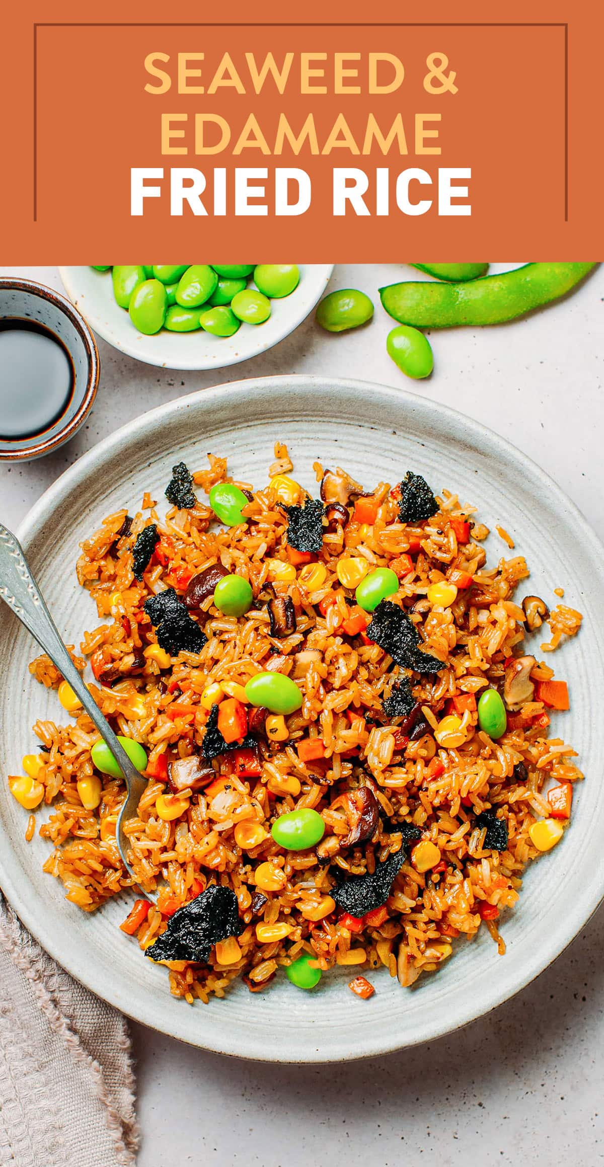 Vibrant and flavorful vegan fried rice with sautéed mushrooms, corn, edamame, and crispy nori! Just 30 minutes, plant-based, and 10-ingredients! #plantbased #friedrice #vegan #edamame