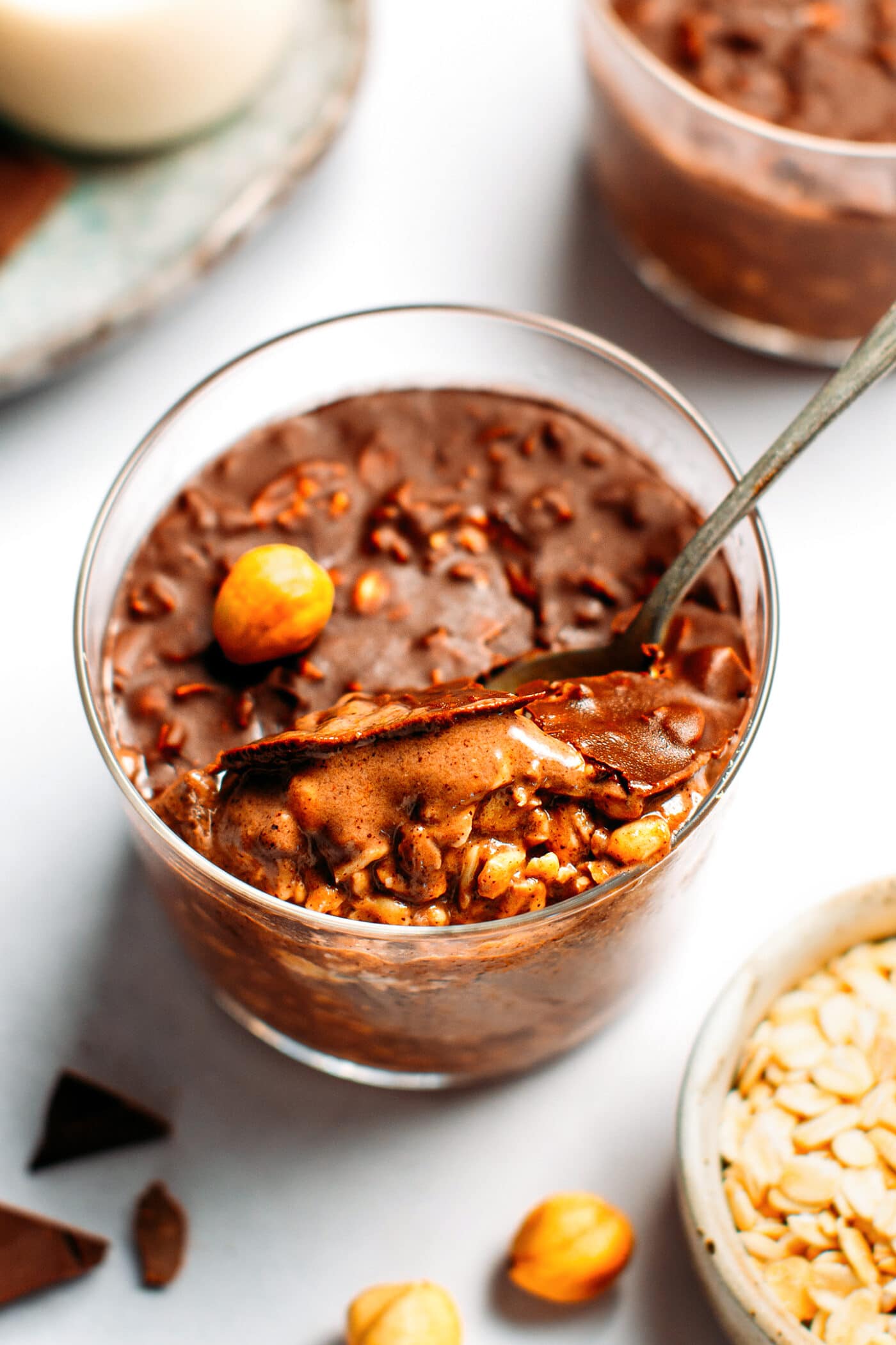 Chocolate overnight oats topped with a crispy chocolate shell.