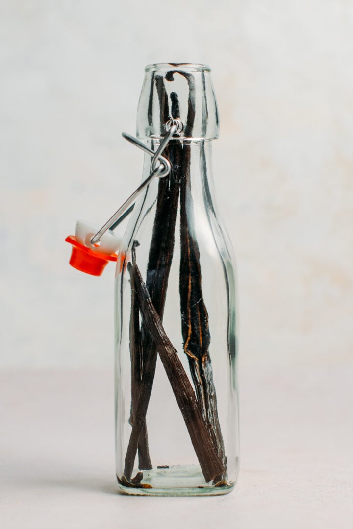 Vanilla beans in a glass bottle.
