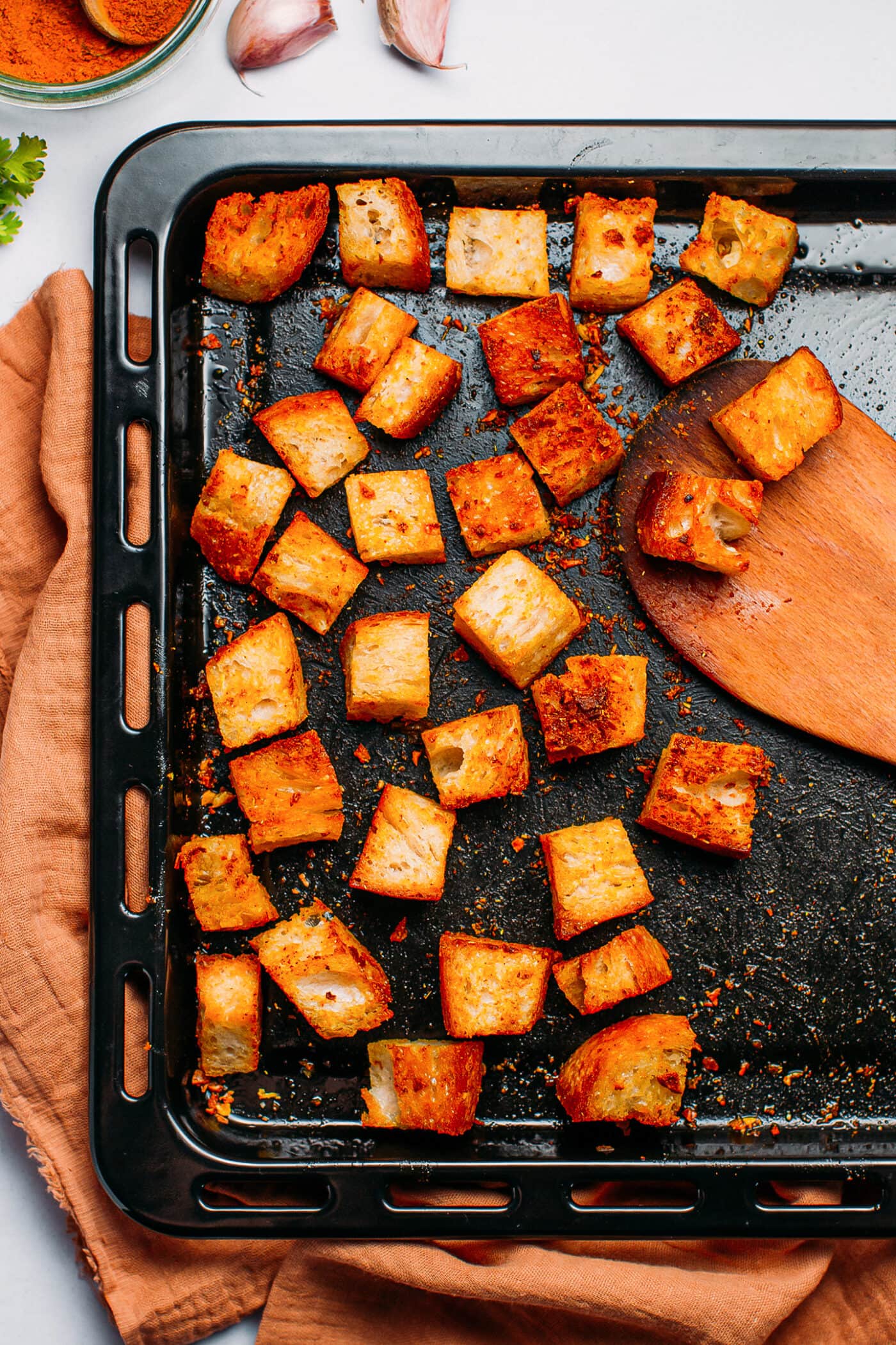 Baked croutons on a baking sheet.
