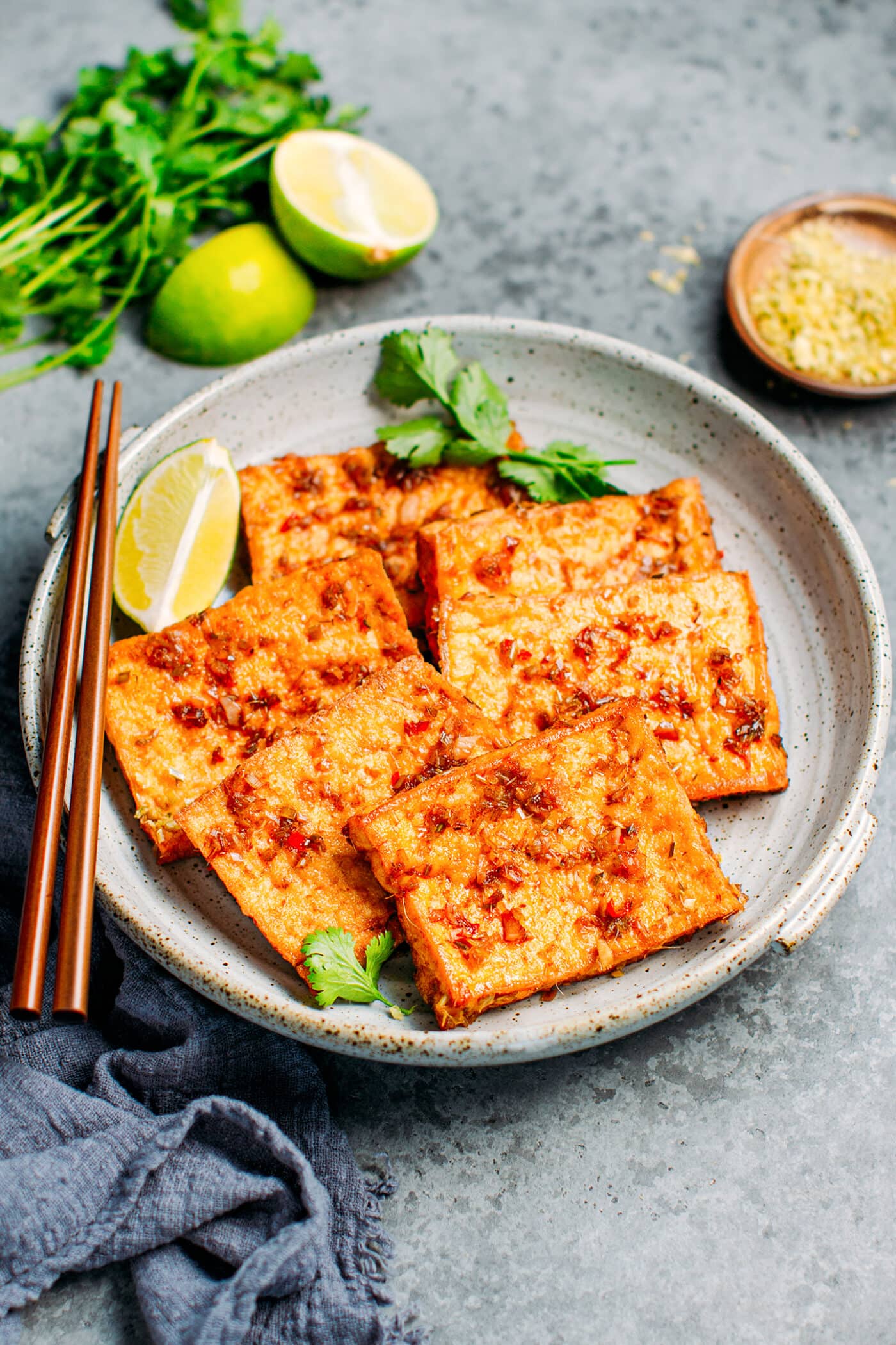 Sautéed tofu with lemongrass, garlic, and chili, in a plate.