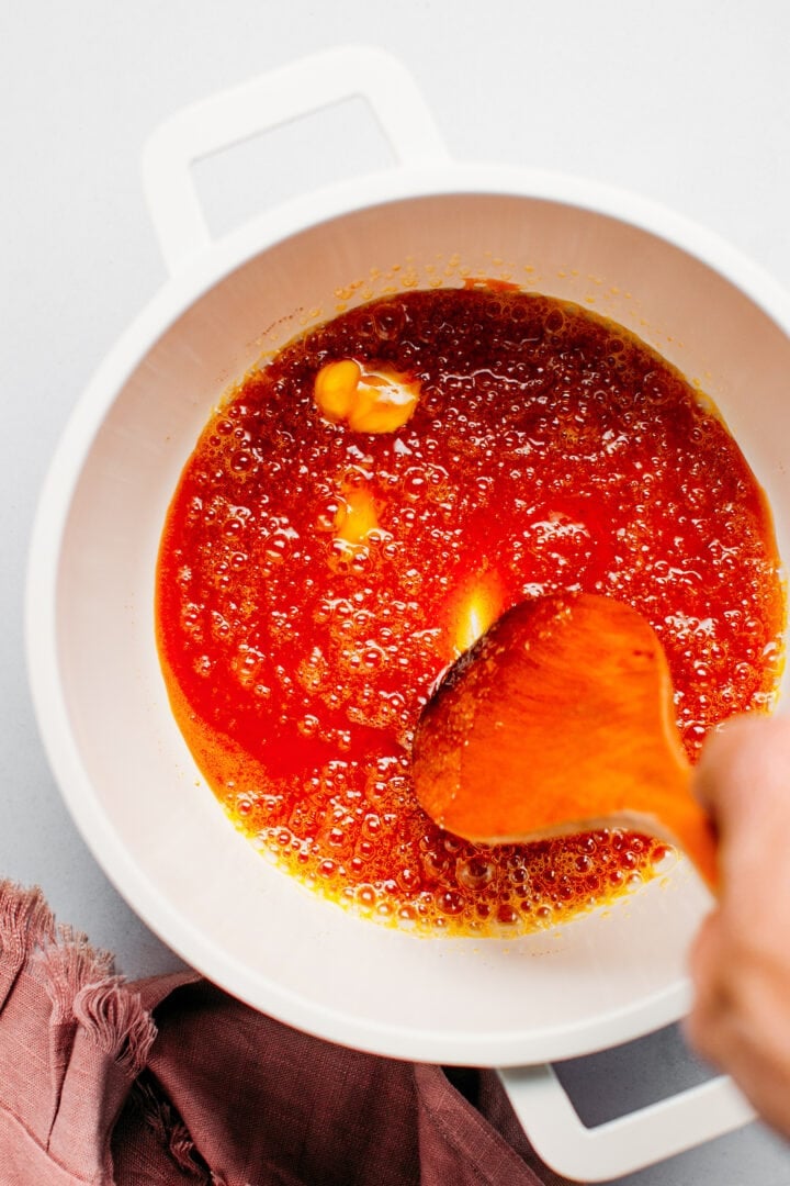 Bubbling caramel in a saucepan.