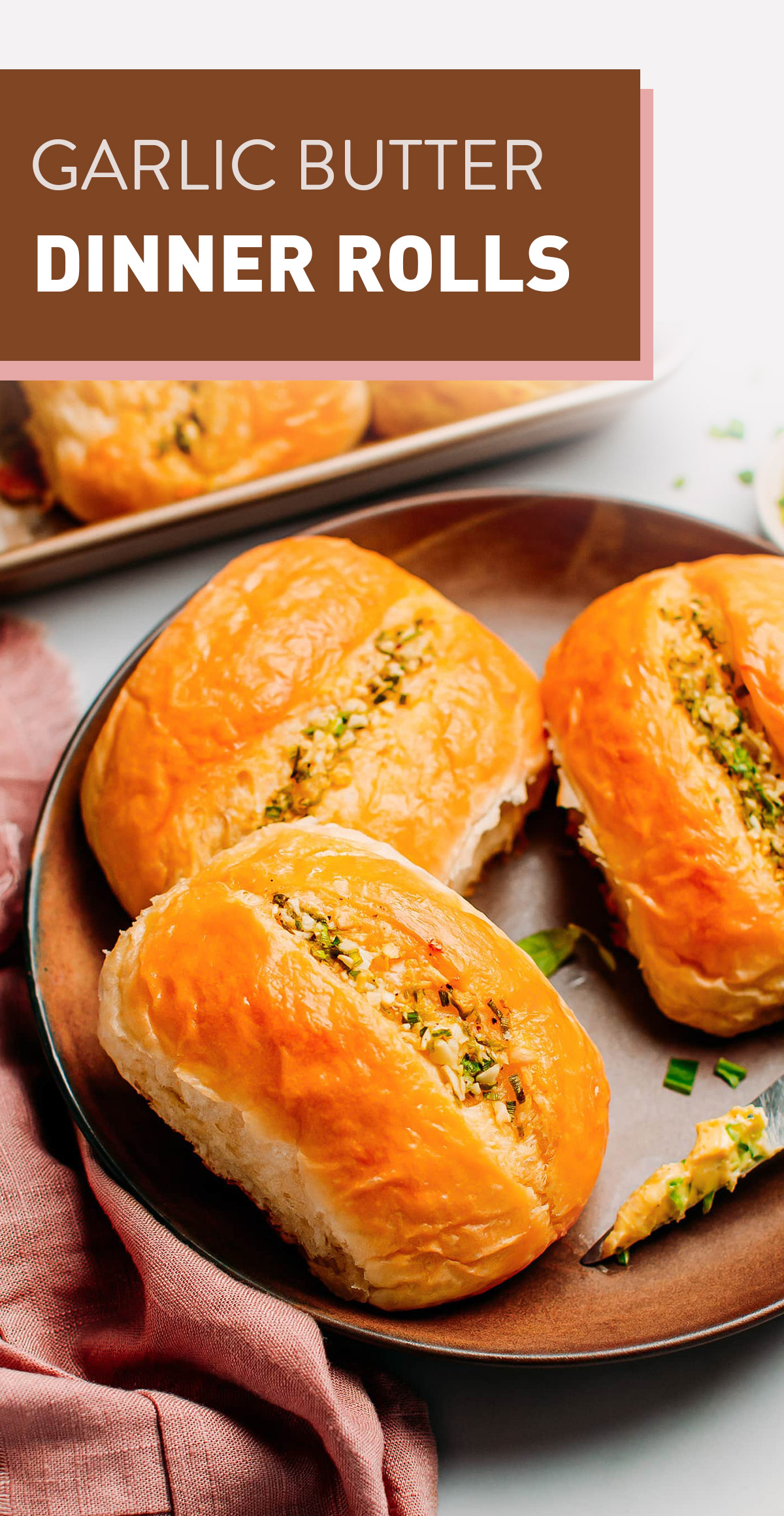 Soft and buttery vegan dinner rolls made with just 8 ingredients and filled with garlic butter! These are easy to prepare and make the perfect accompaniment to soups, stews, curries, and more! #vegan #baking #dinnerrolls #thanksgiving #garlicbutter #veganbaking