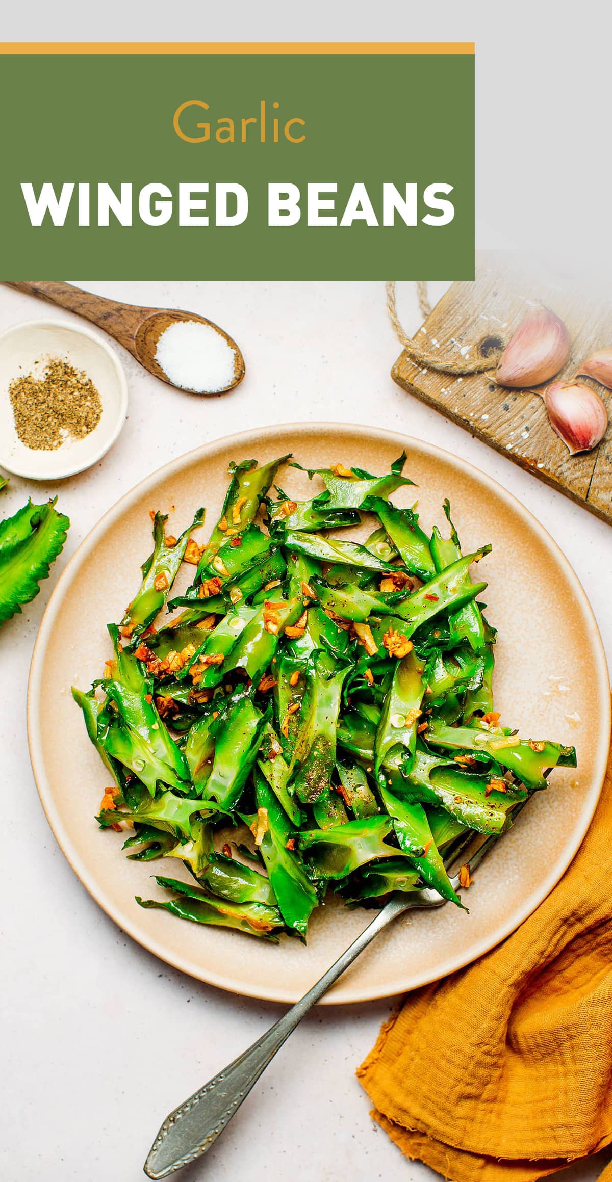 Learn how to cook winged beans aka dragons beans! It's crunchy, garlicky, and perfectly seasoned! Serve as a side with steamed white rice, tofu, tempeh, etc! #beans #vegan #plantbased #side