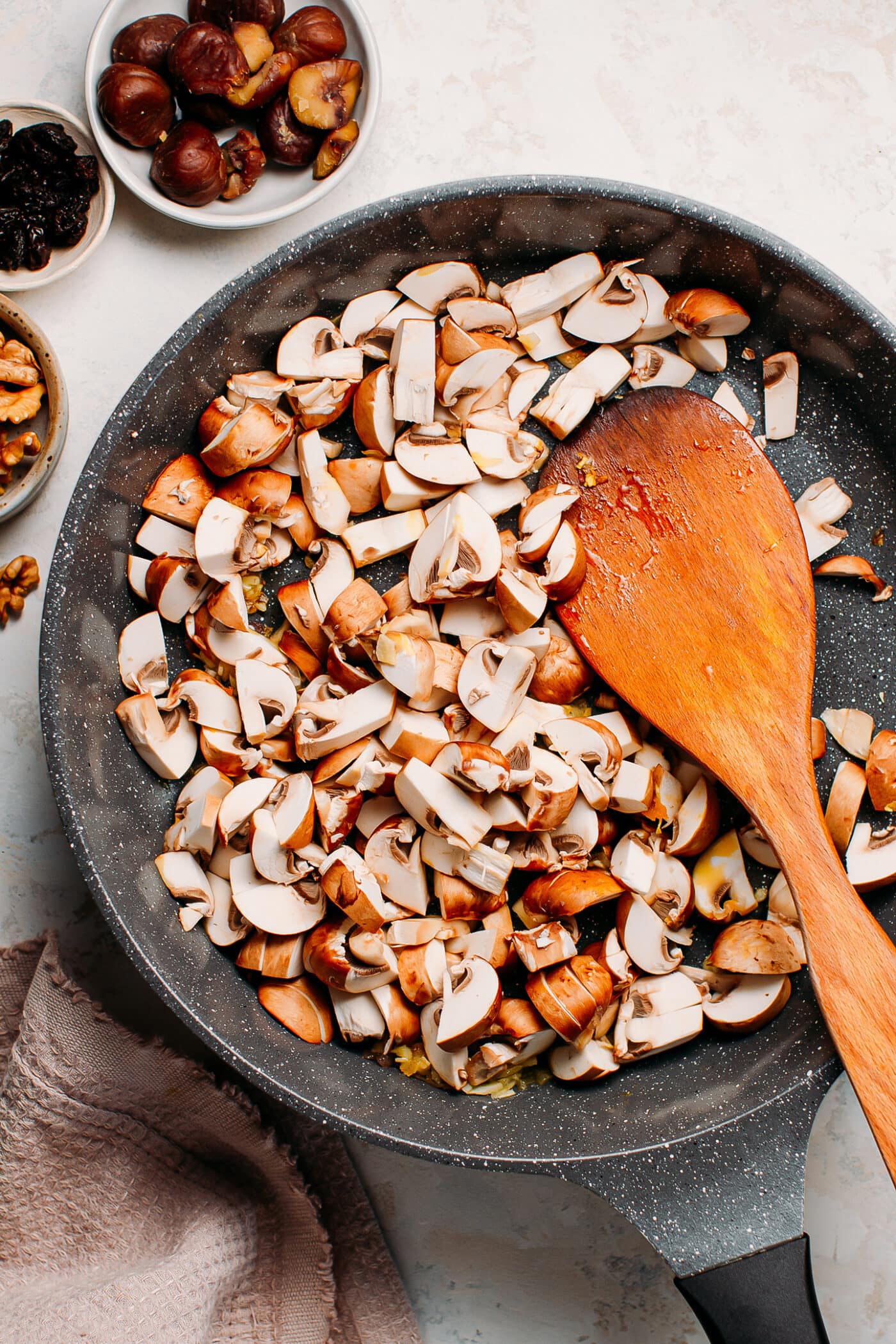 Sautéed mushrooms in a skillet.