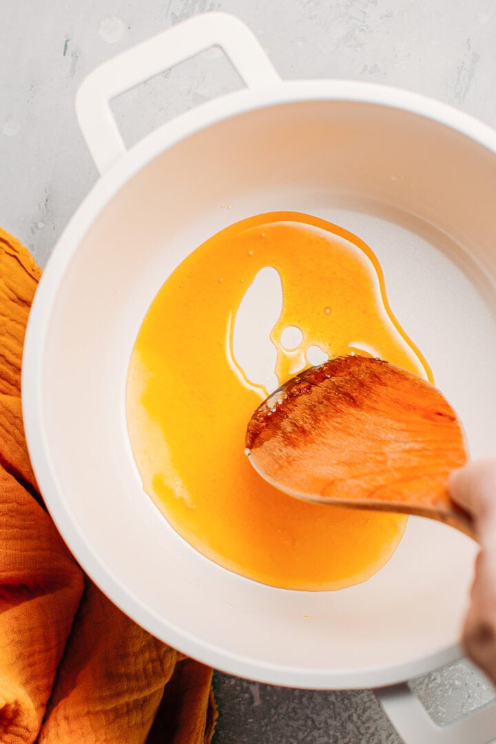 Making caramel in a pan.