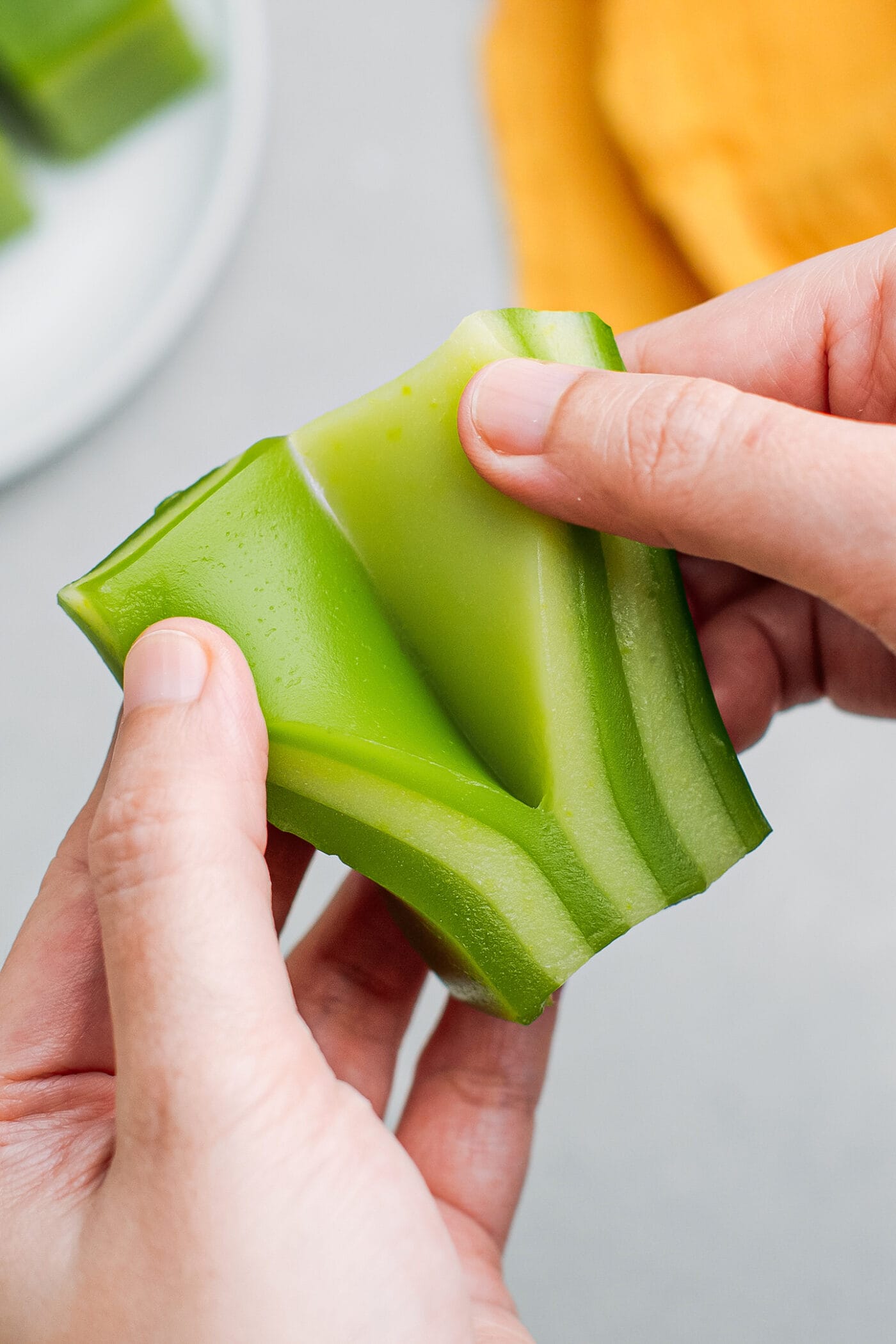 Peeling layers of a Vietnamese steamed layer cake.