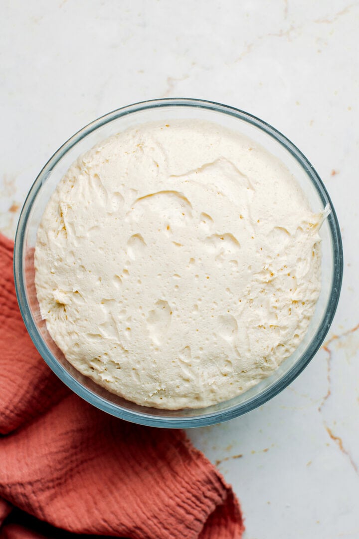 Dough in a bowl after a rise.
