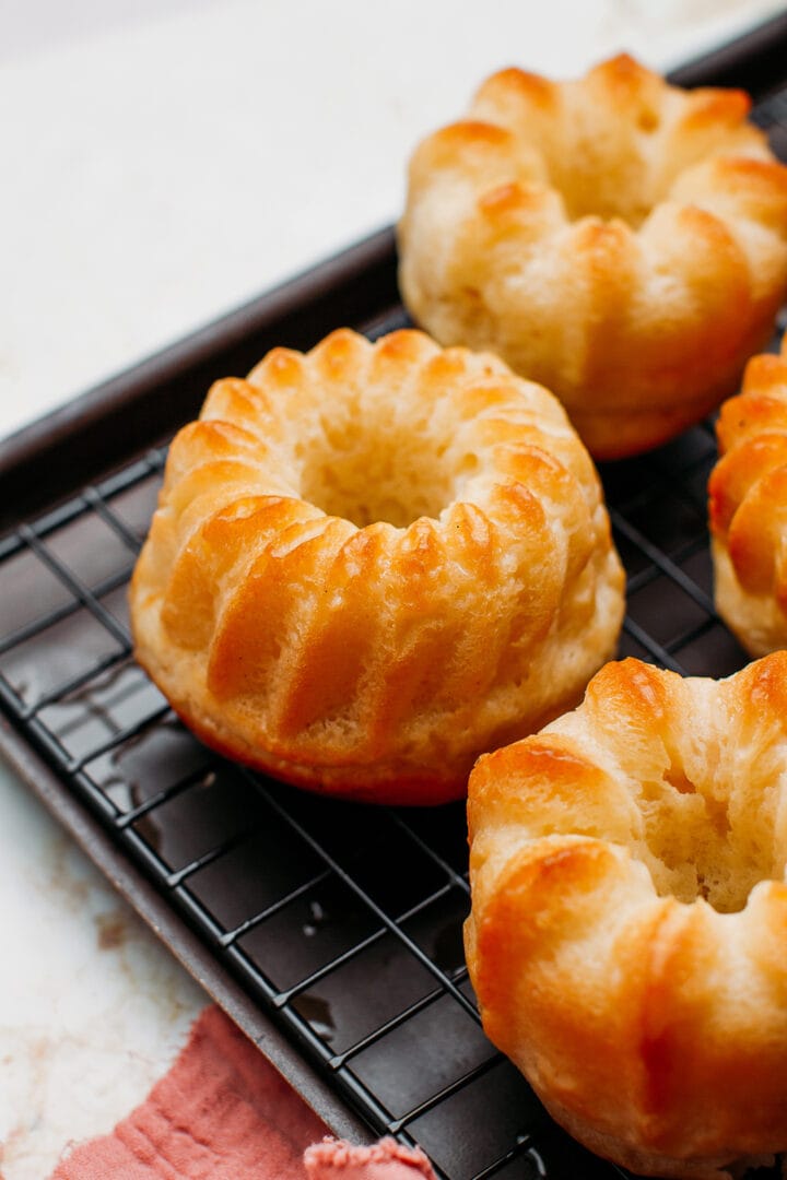 Close up of rum baba on a cooling rack.