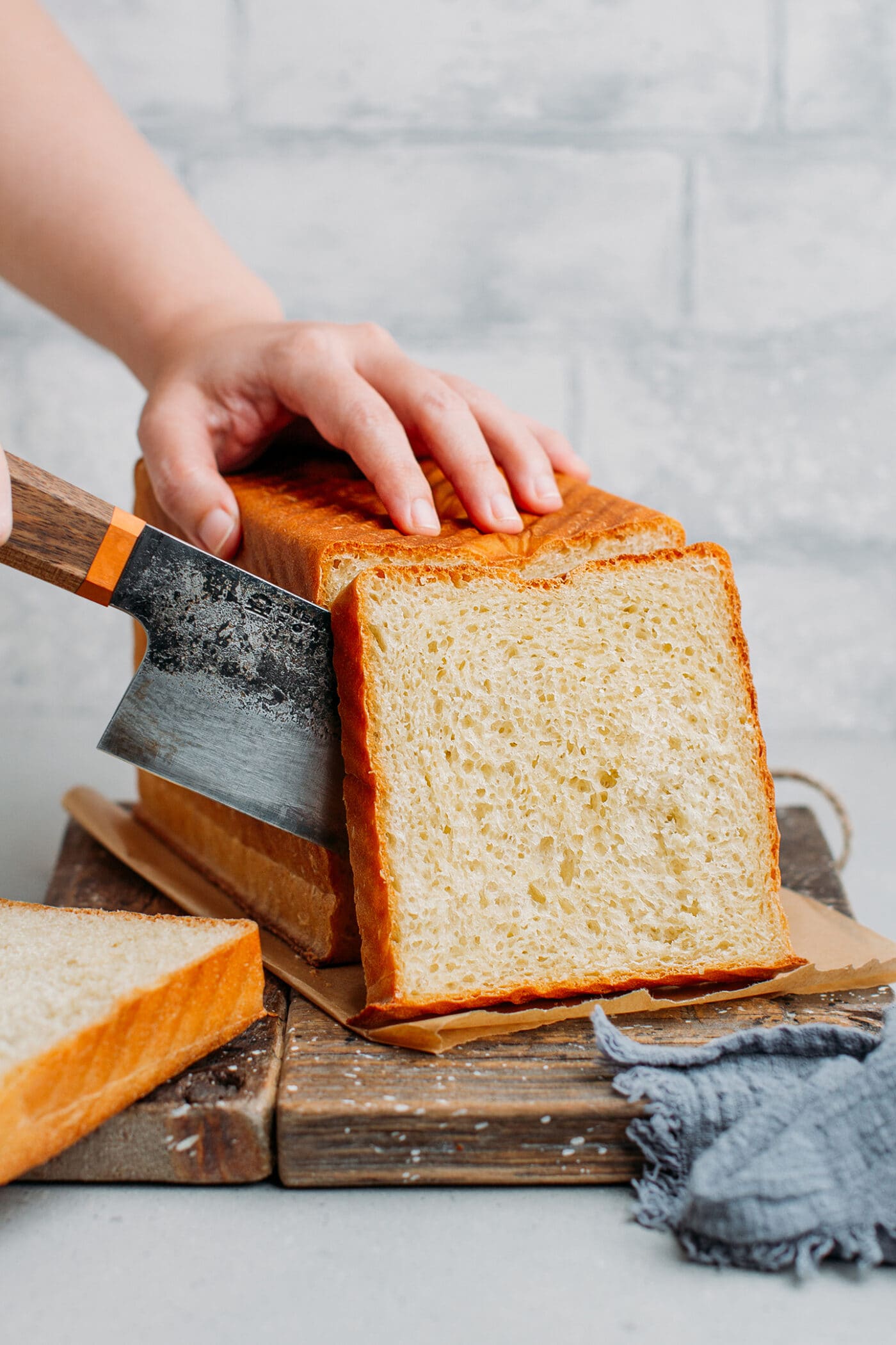 Slicing Pullman sandwich bread.