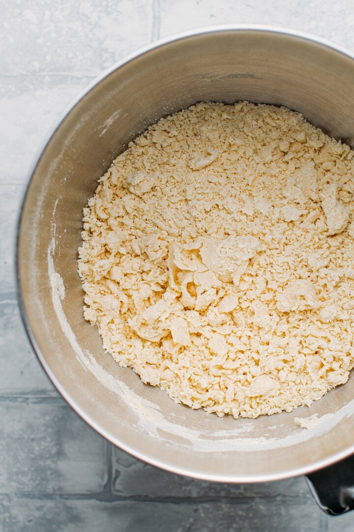 Noodle dough in a mixer bowl.