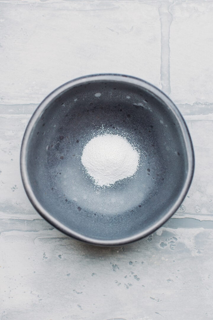 Baked baking soda in a small bowl.
