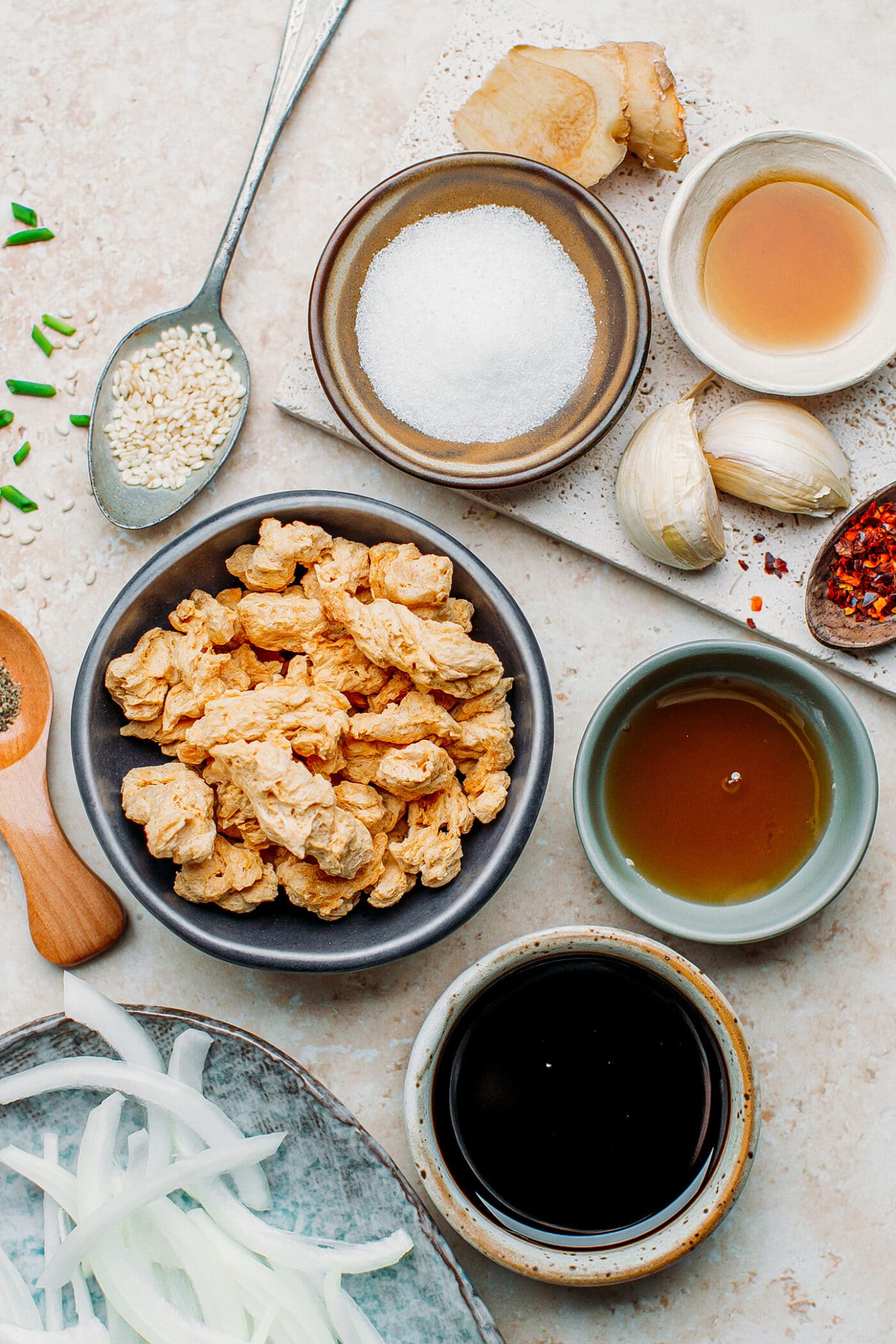 Ingredients like soy curls, toasted sesame oil, soy sauce, garlic, and ginger.