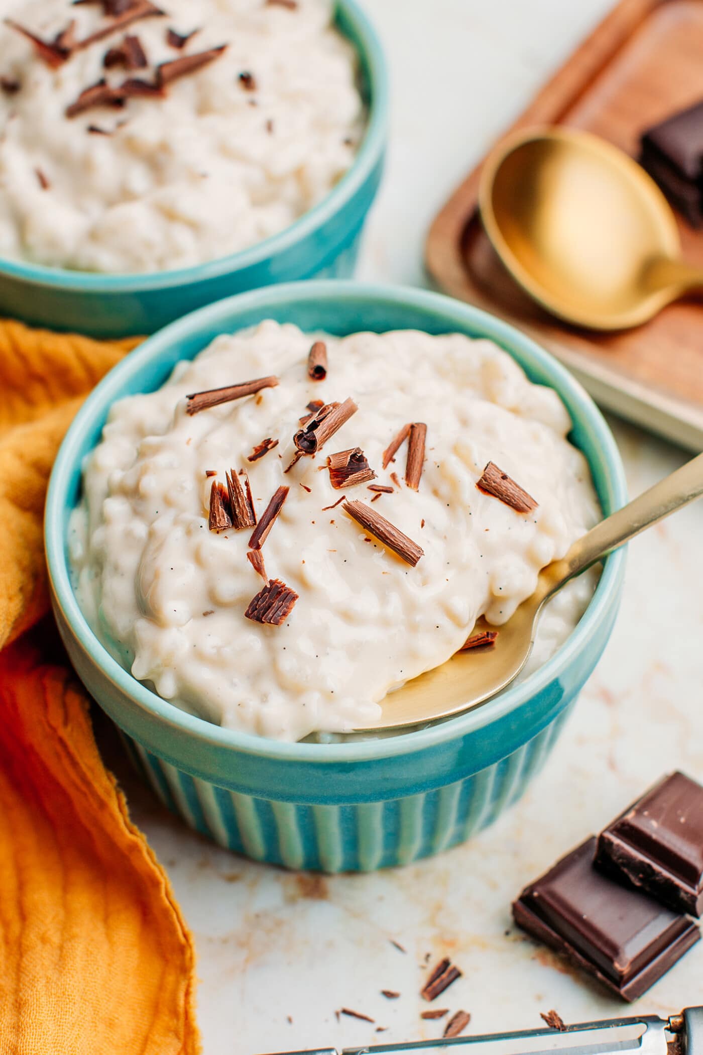Rice pudding topped with shaved chocolate.
