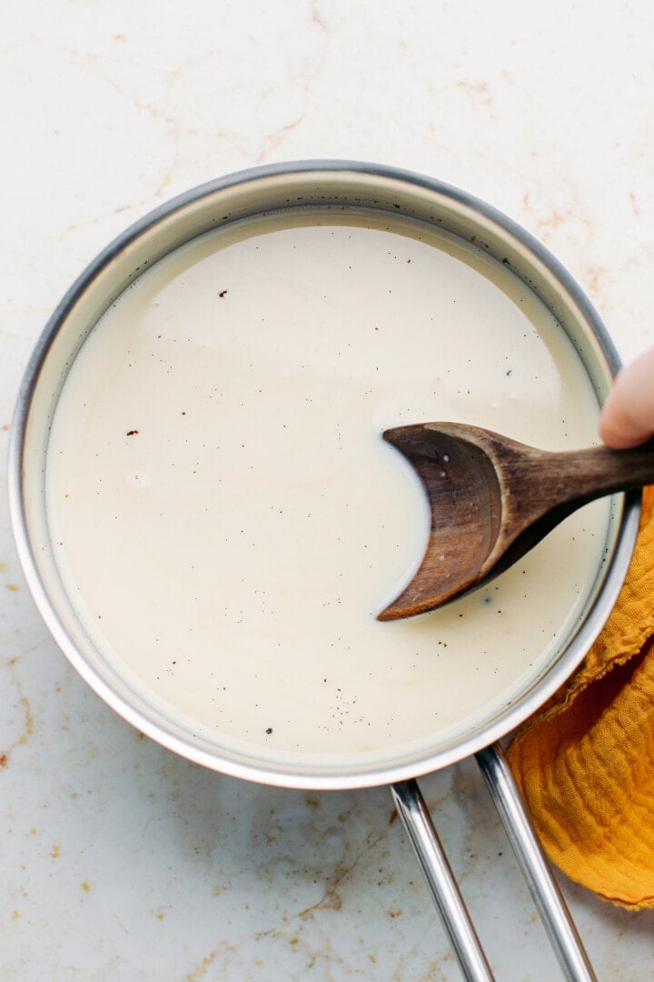 Rice and milk in a saucepan.