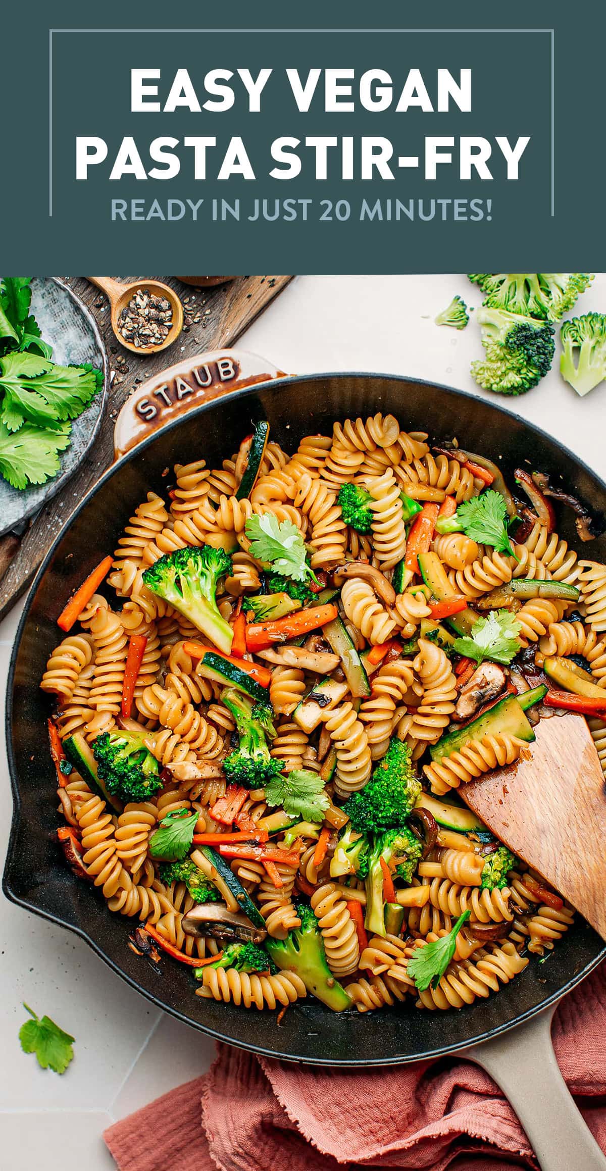 The ultimate last-minute weeknight dinner recipe! This colorful 20-minute pasta stir fry comes with plenty of sautéed vegetables like broccoli, carrots, and mushrooms. It is then tossed with a delicious sweet and salty black pepper sauce! #stirfry #vegan #plantbased