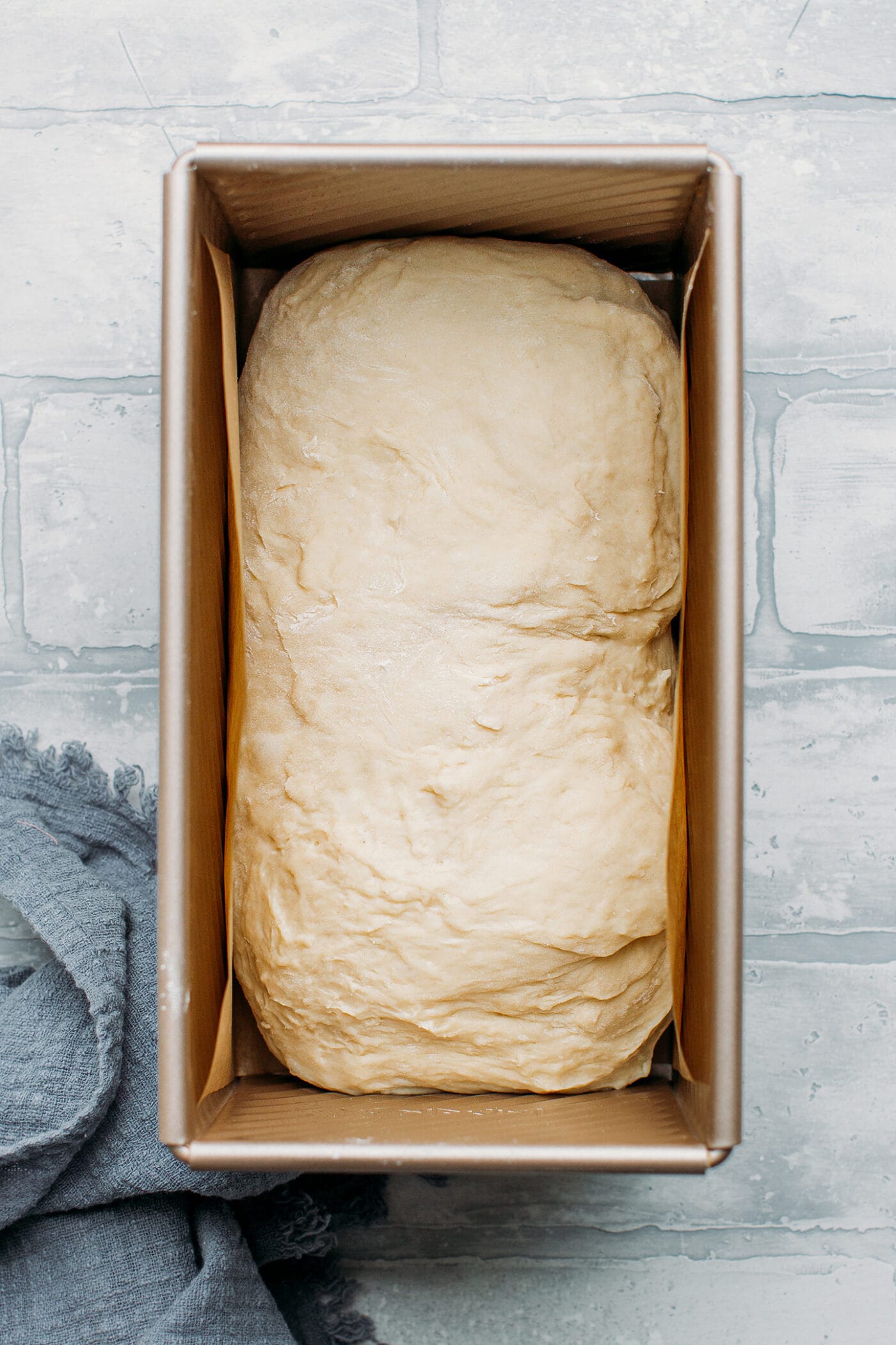 Dough in a loaf pan.