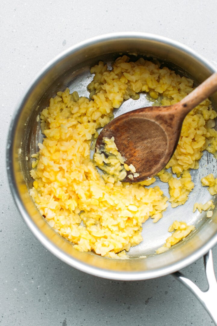 Cooked mung beans in a saucepan.