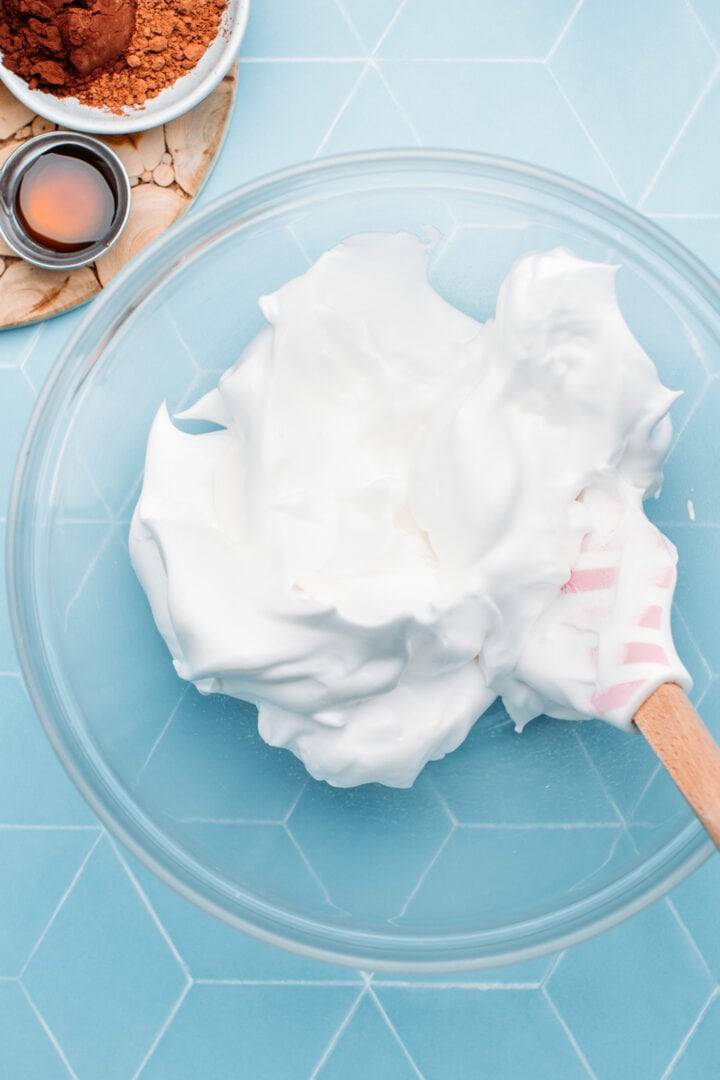 Whipped aquafaba in a bowl.