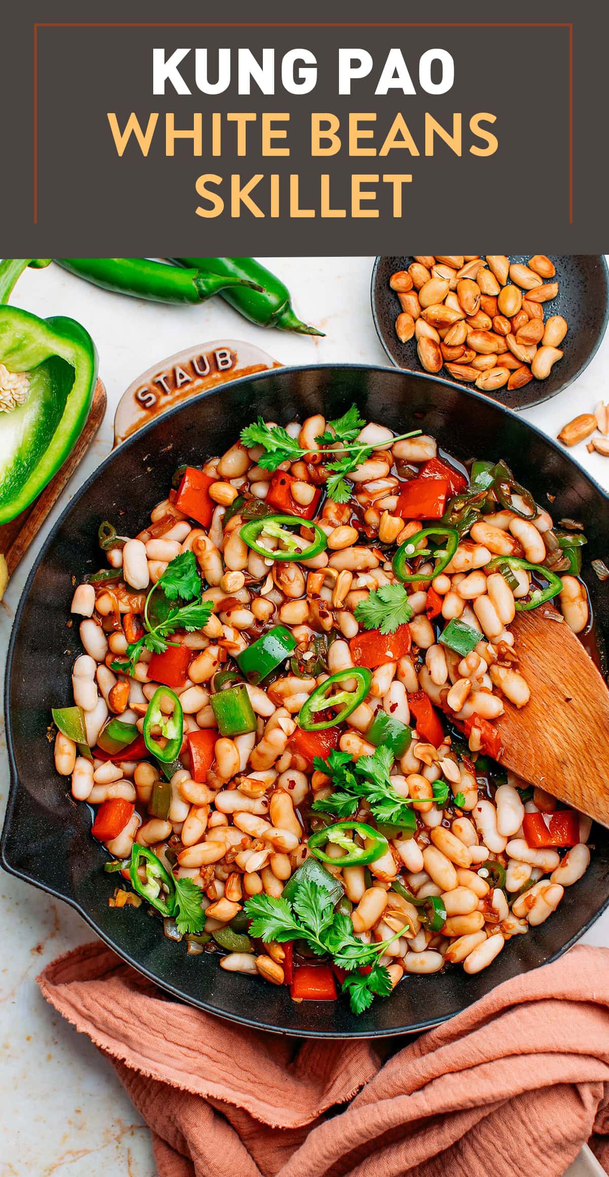 These tender Kung Pao white beans are served in a delicious Chinese-inspired sauce! It's an impressive, yet simple dish, that packs the perfect balance of sweet, salty, spicy, and sour. Plus, it has an addicting crunch thanks to the addition of bell peppers, roasted peanuts, and Jalapeño peppers! #vegan #chinesedish