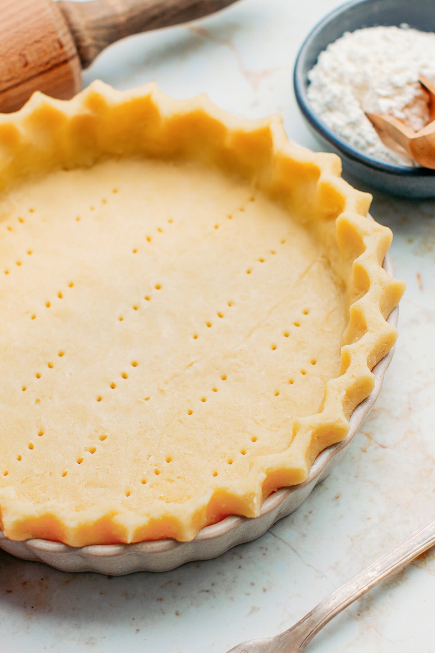 Close-up of unbaked vegan pie crust.