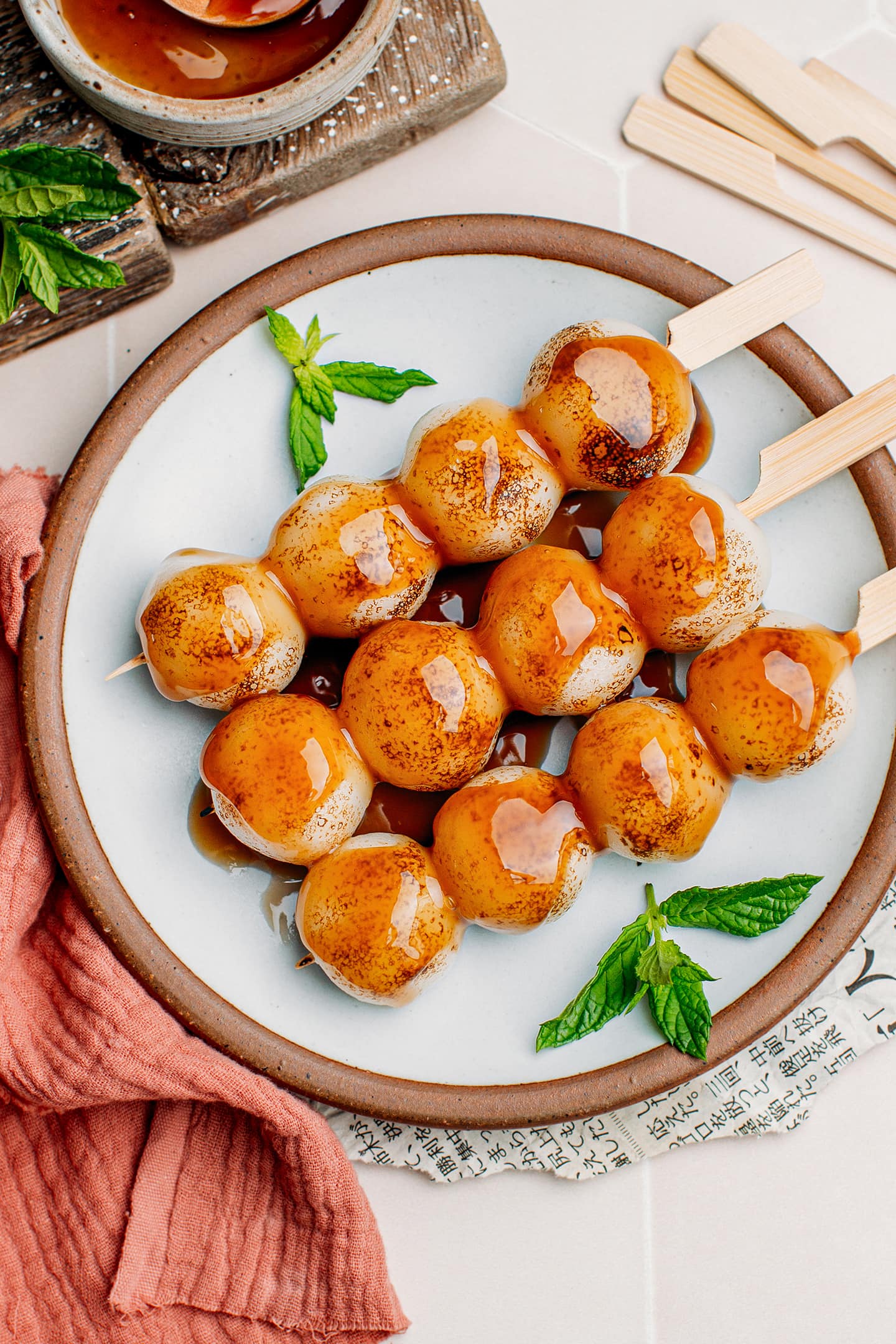Top view of three skewers with rice dumplings.
