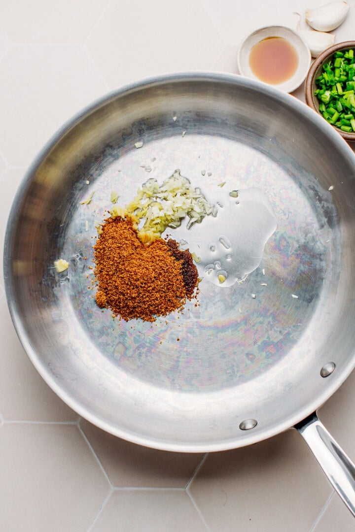 Brown sugar, garlic, and ginger in a skillet.