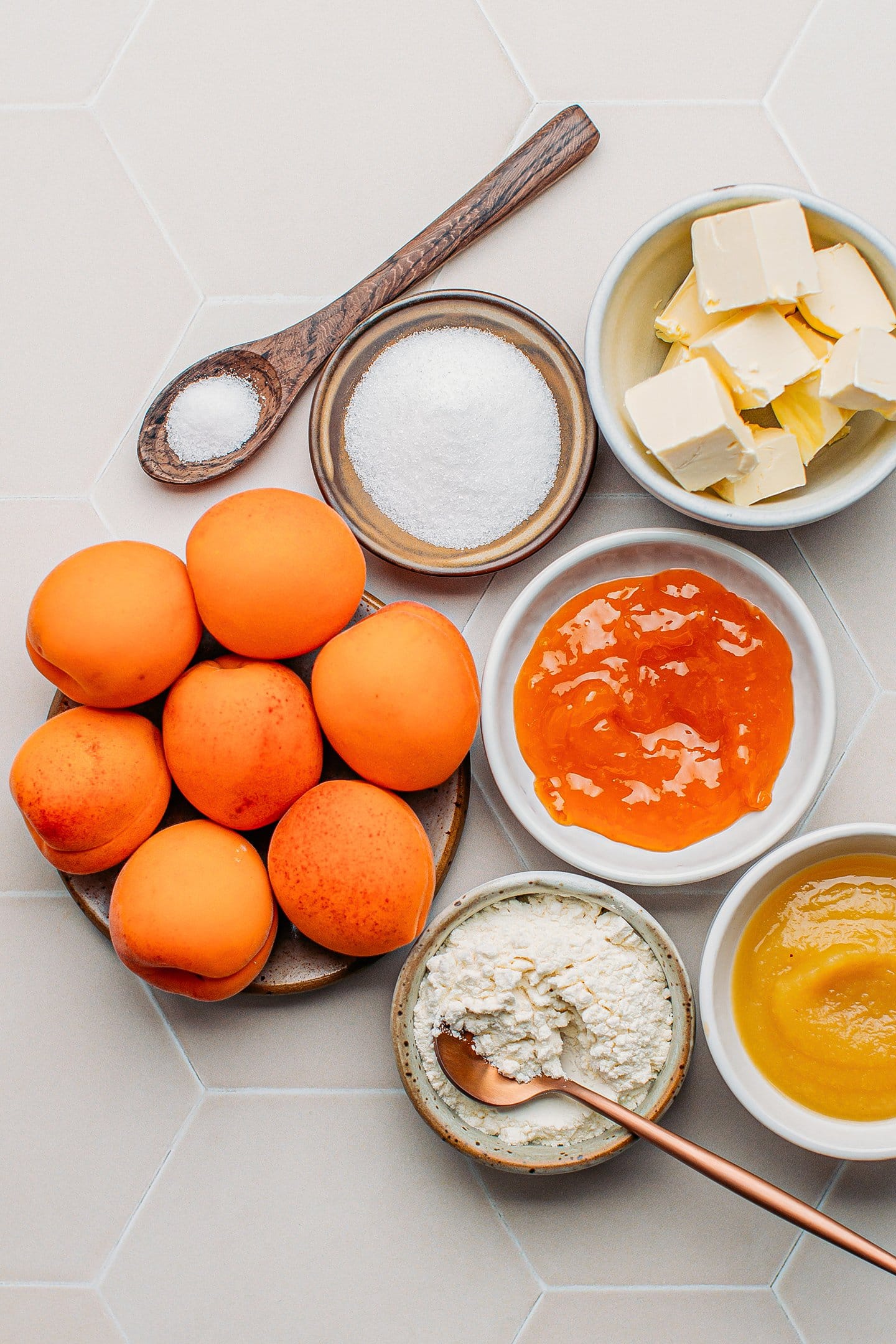 Ingredients like apricots, butter, jam, applesauce, and sugar.