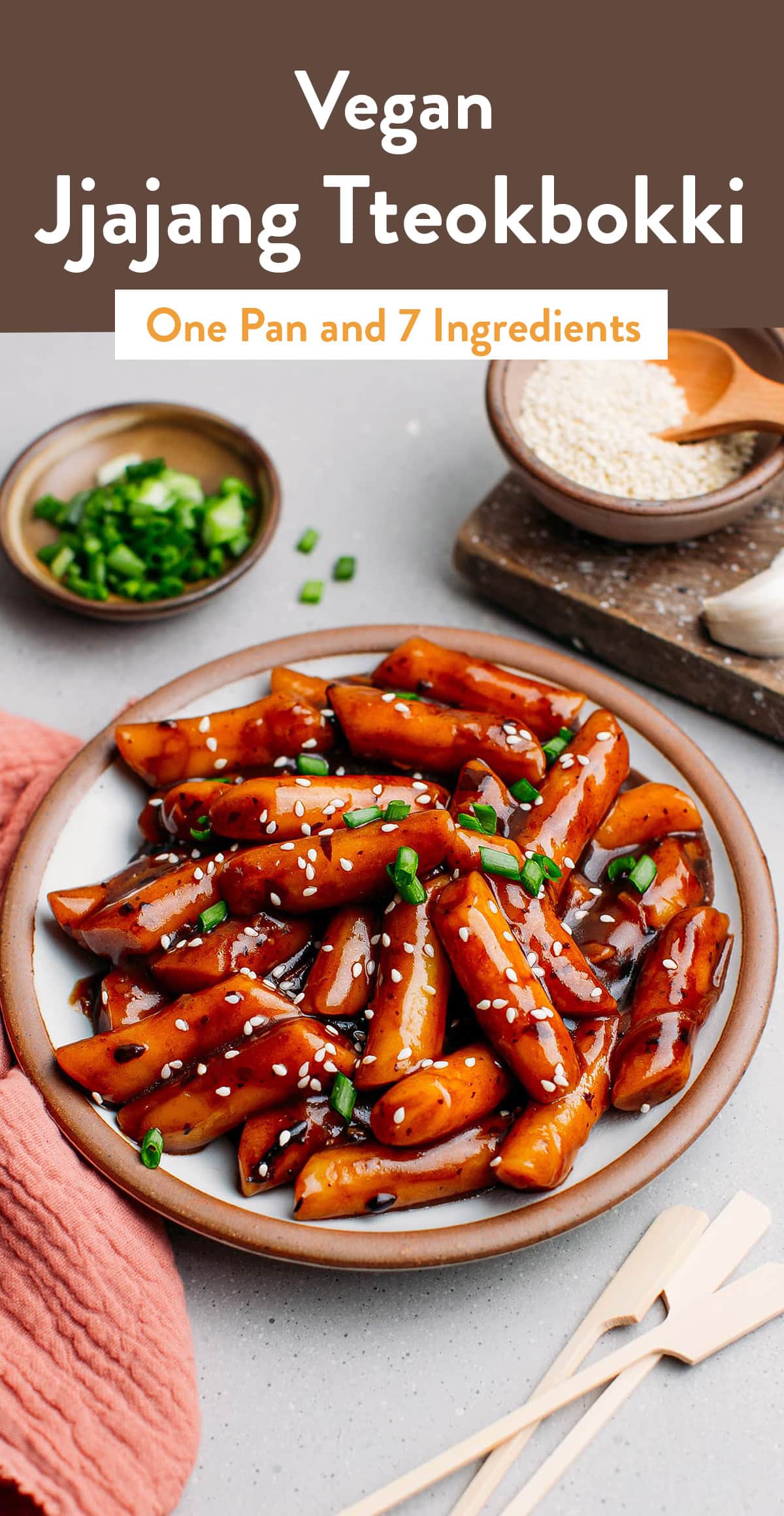 Jjajang Tteokbokki is a classic Korean dish with chewy rice cakes cooked in a savory and garlicky black bean sauce. It's perfect if you want to indulge in Tteokbokki without the spiciness! Vegan, one pan, and 7 ingredients! #korean #tteokbokki #asian