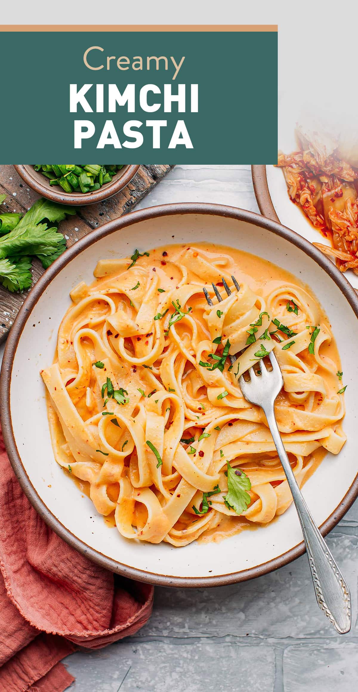 Introducing the creamiest kimchi pasta! This comforting dish features tender fettuccine coated in a tangy and spicy cashew kimchi sauce. This rich and creamy kimchi pasta requires just 20 minutes and 5 ingredients! #kimchi #pasta