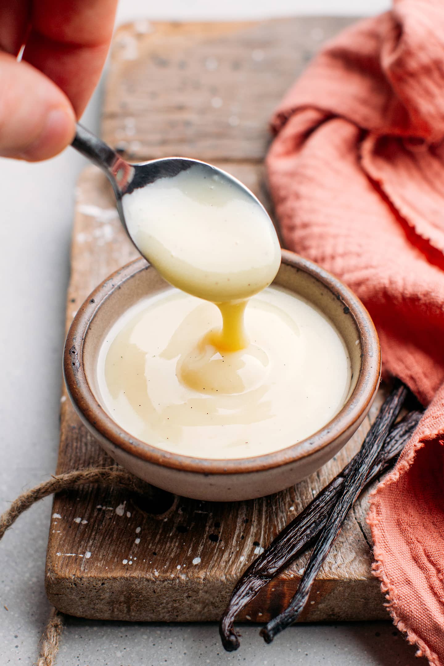 Spoonful of vegan crème anglaise.